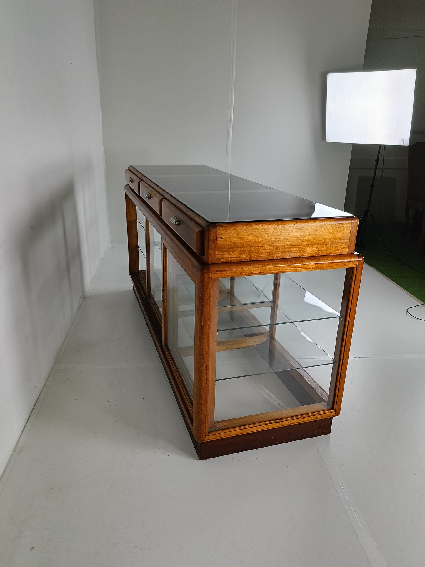 Elegant Antique Store Display With Glass Shelves