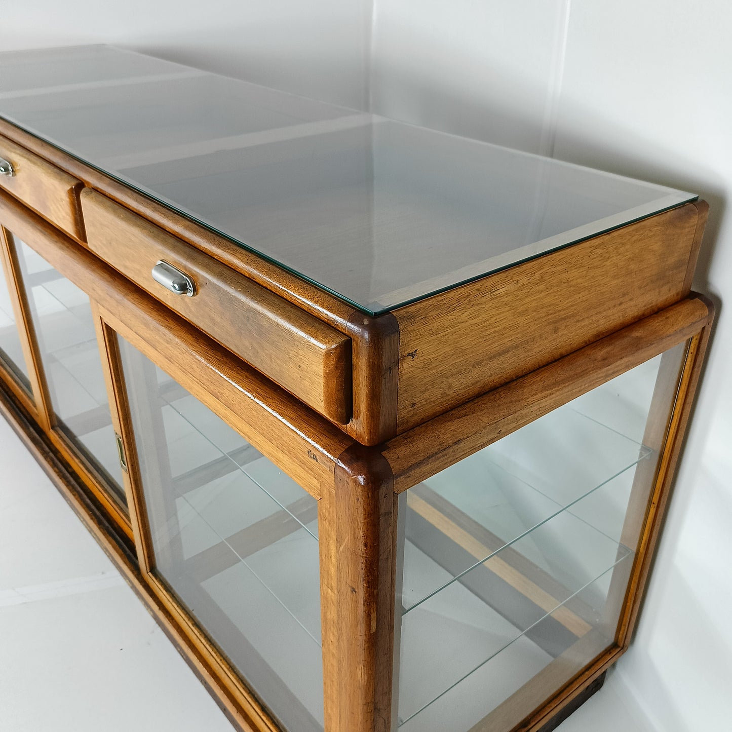 Elegant Antique Store Display With Glass Shelves