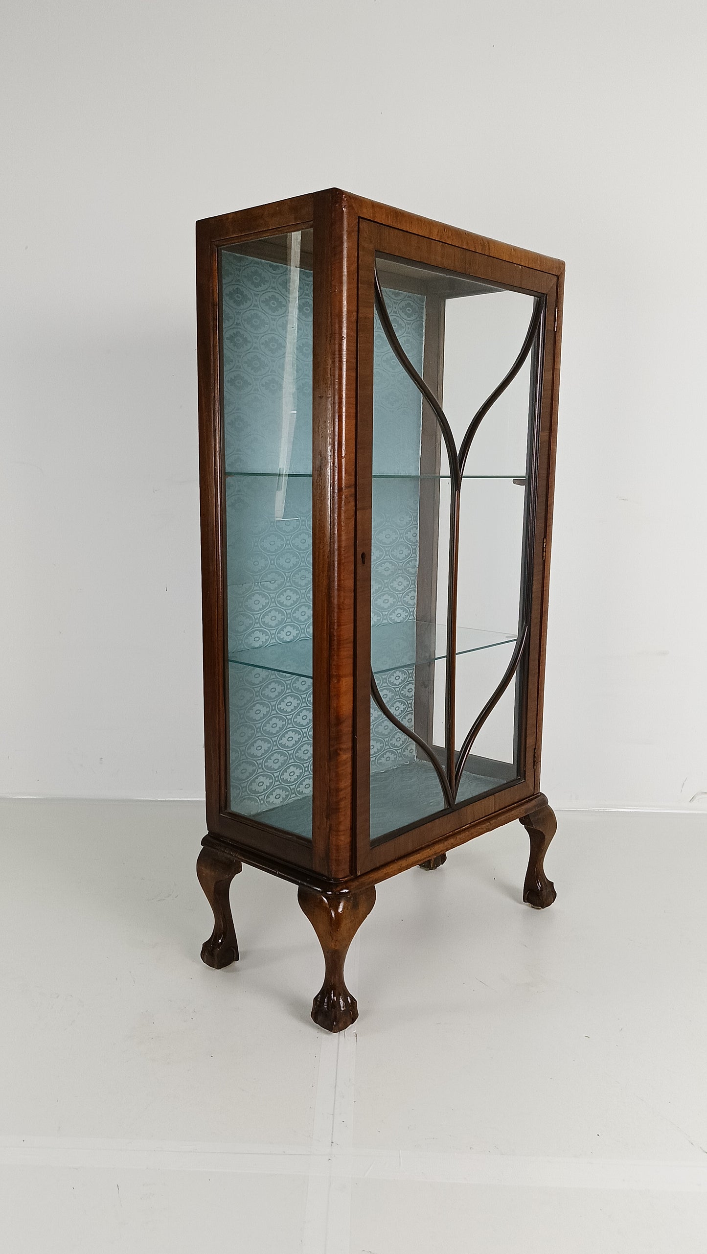 Small antique display cabinet closet by Bridgeman Antiques NL, featuring glass-paneled doors and vintage wooden craftsmanship.