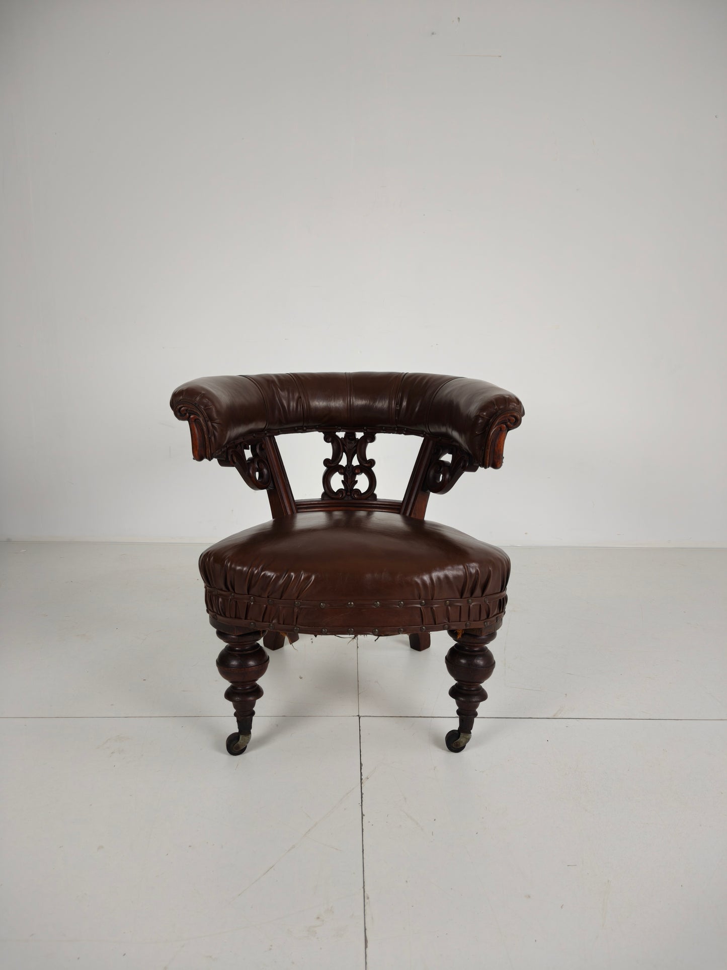 Antique Leather Armchair by Robson & Son – Carved Wood & Castors, Newcastle