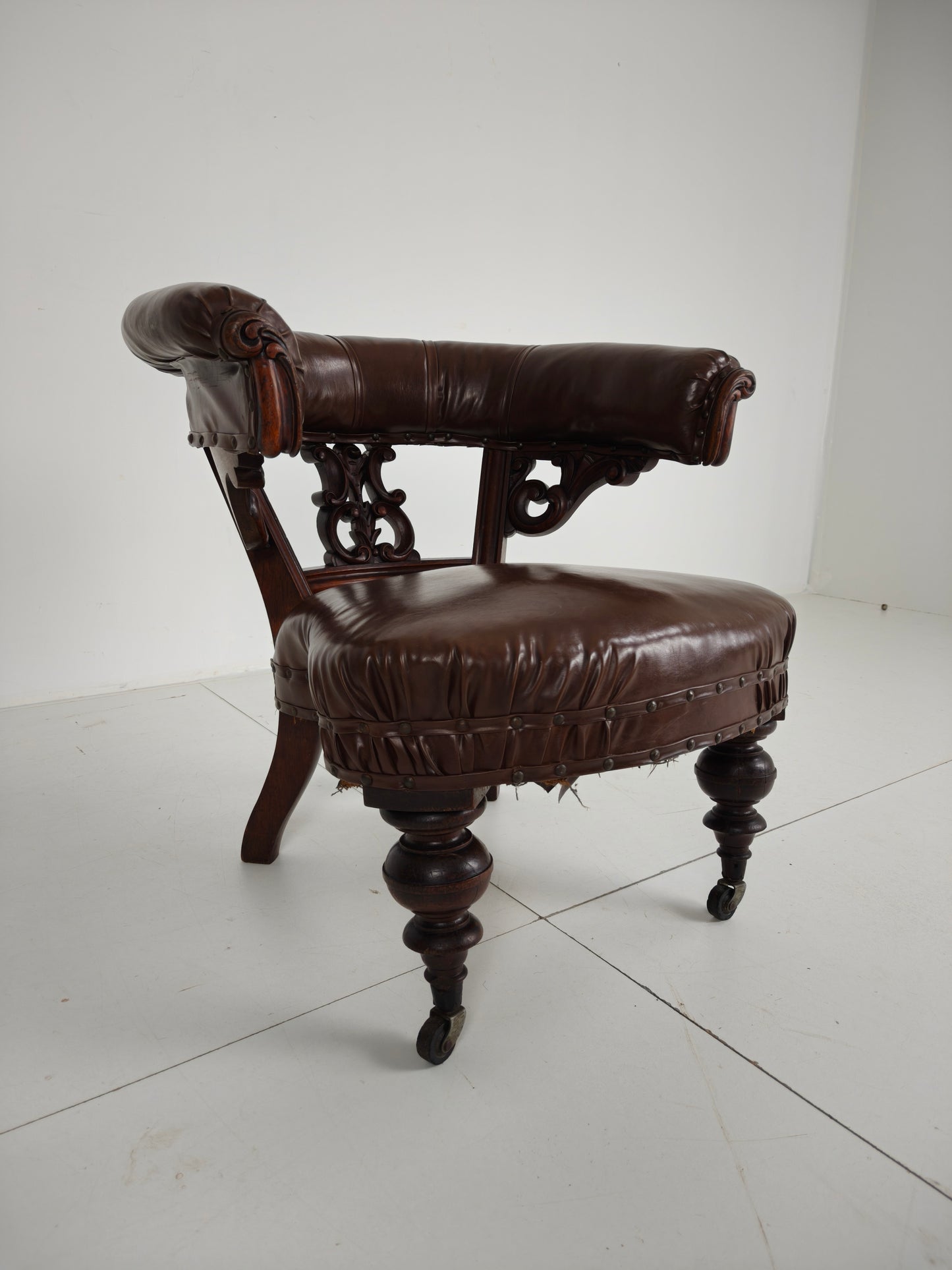 Antique Leather Armchair by Robson & Son – Carved Wood & Castors, Newcastle