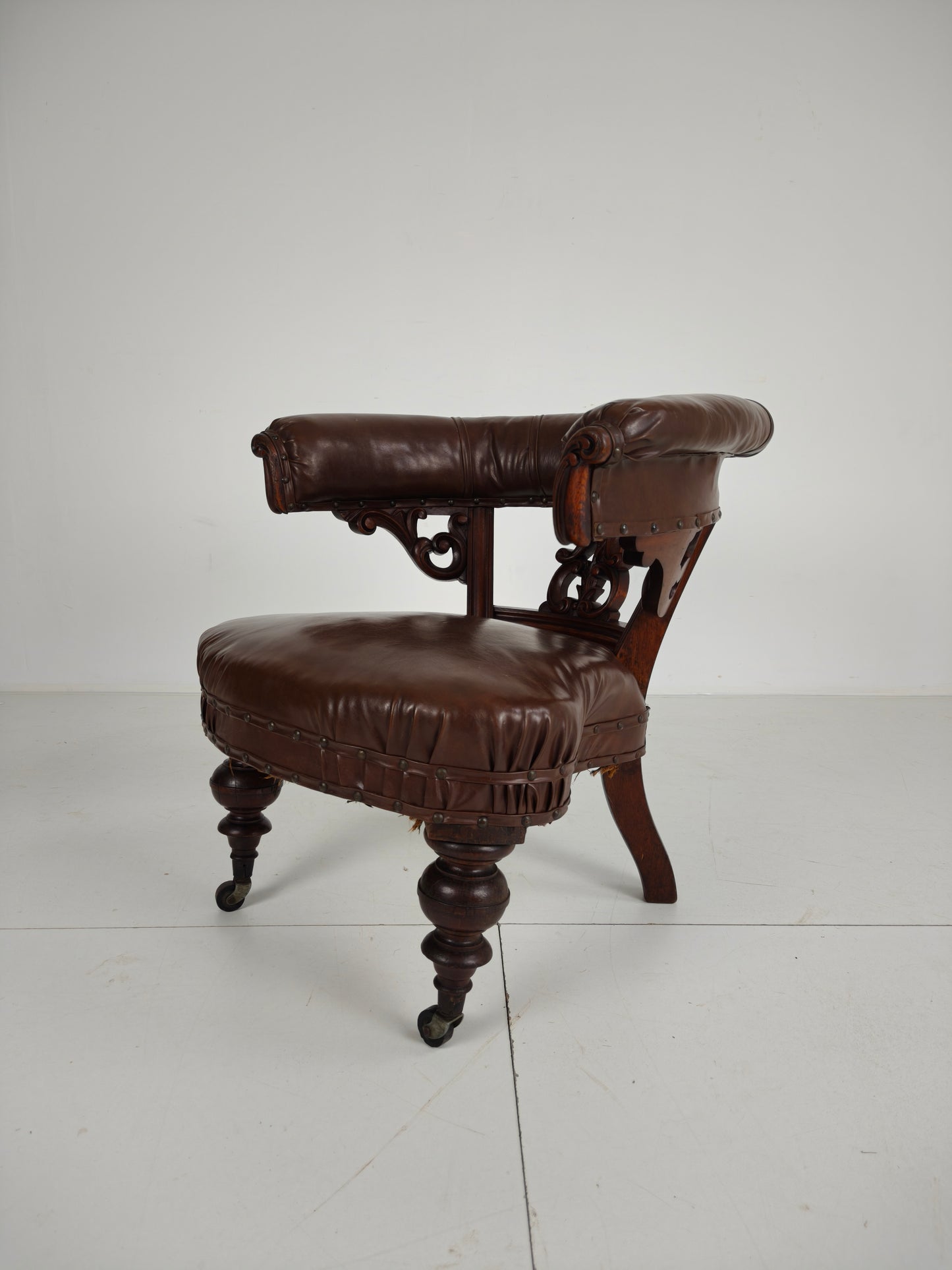 Antique Leather Armchair by Robson & Son – Carved Wood & Castors, Newcastle