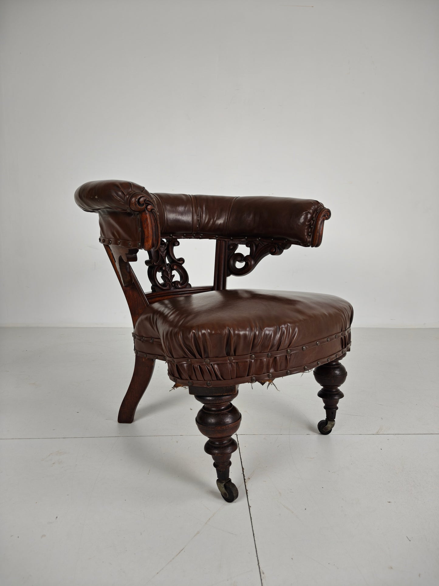 Antique Leather Armchair by Robson & Son – Carved Wood & Castors, Newcastle