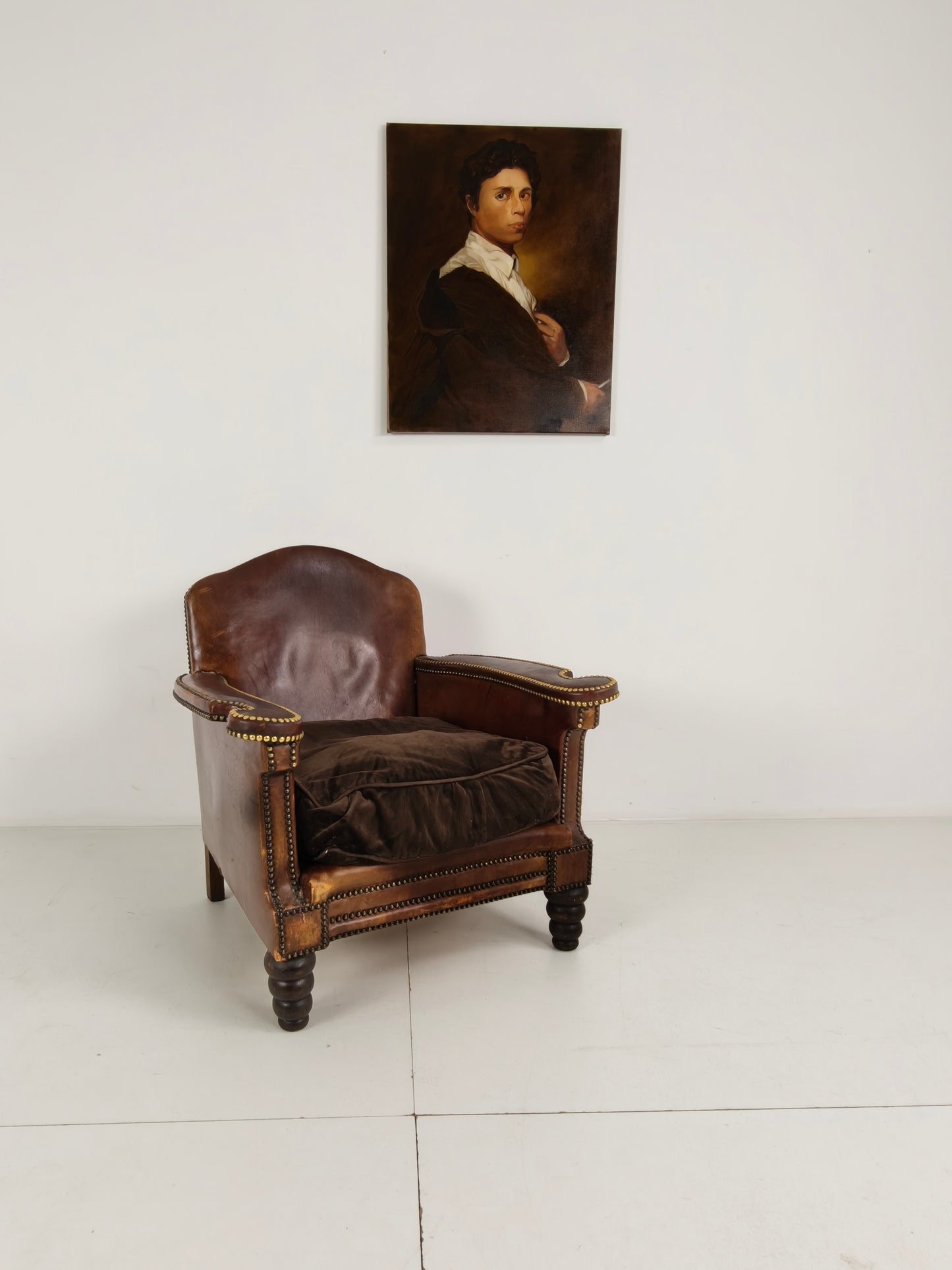 Antique Leather Club Chair with Stud Detailing