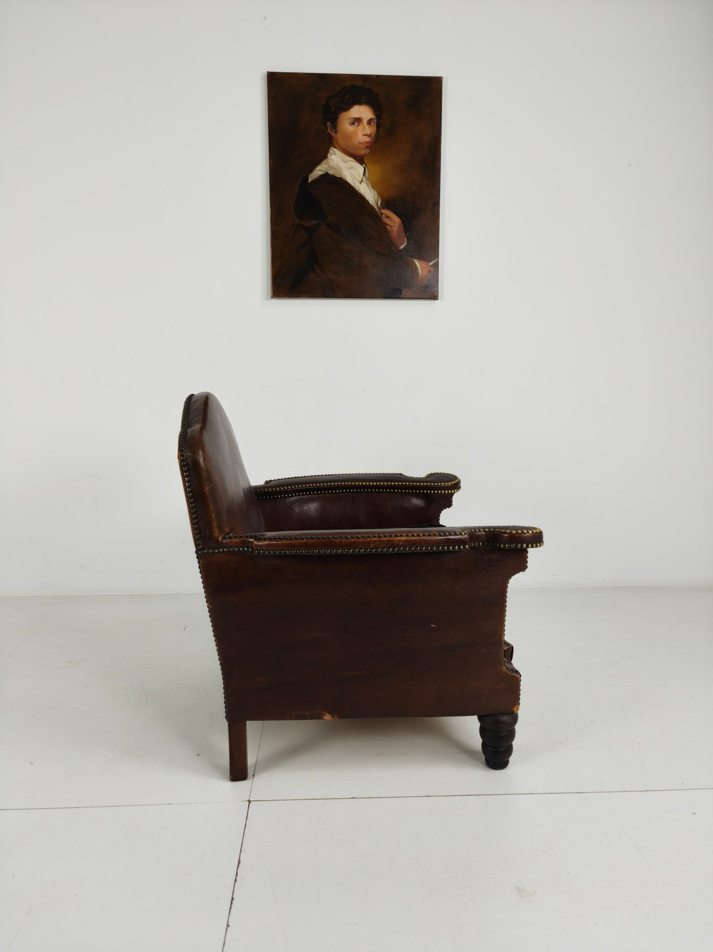Antique Leather Club Chair with Stud Detailing