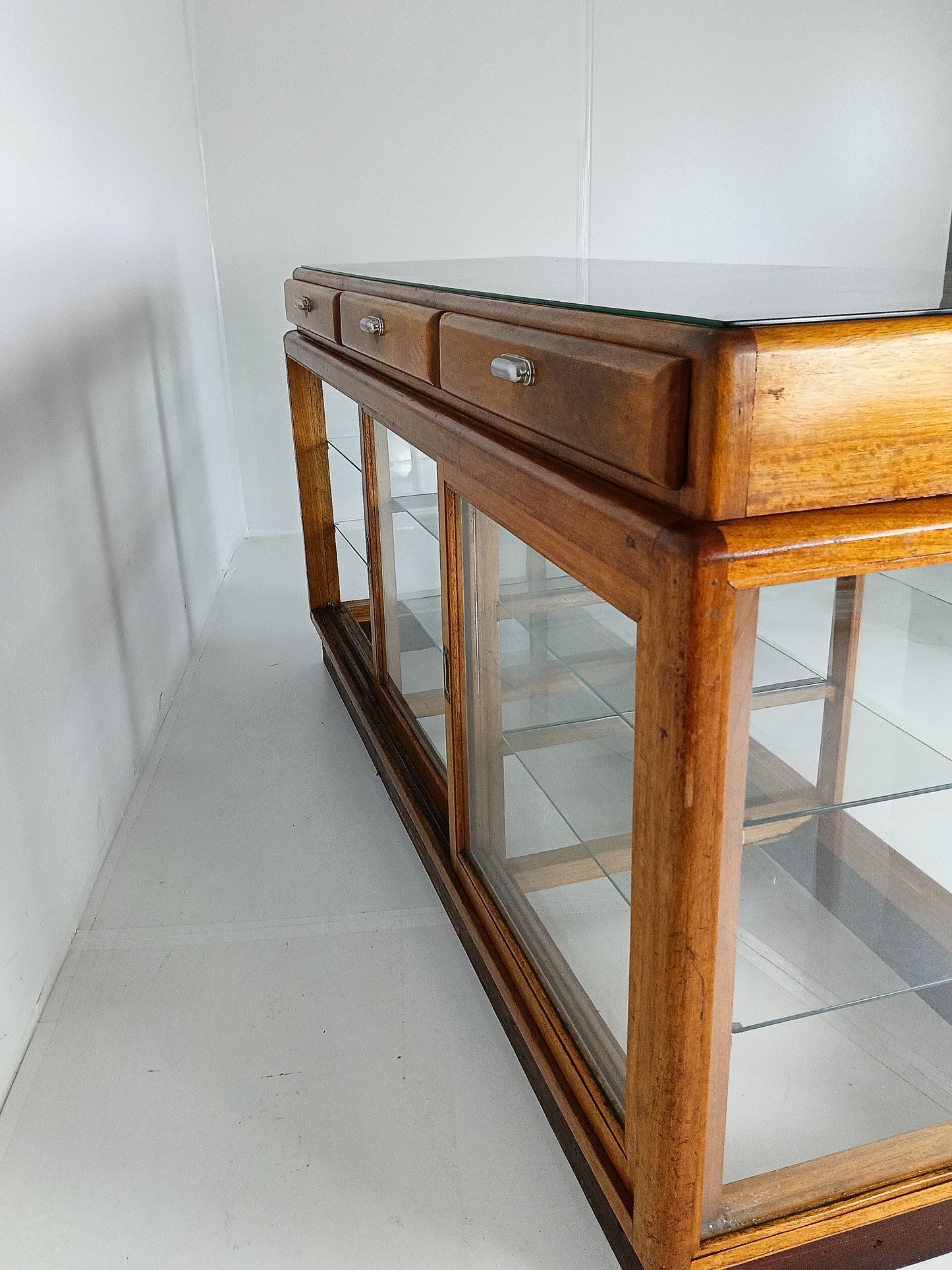 Elegant Antique Store Display With Glass Shelves