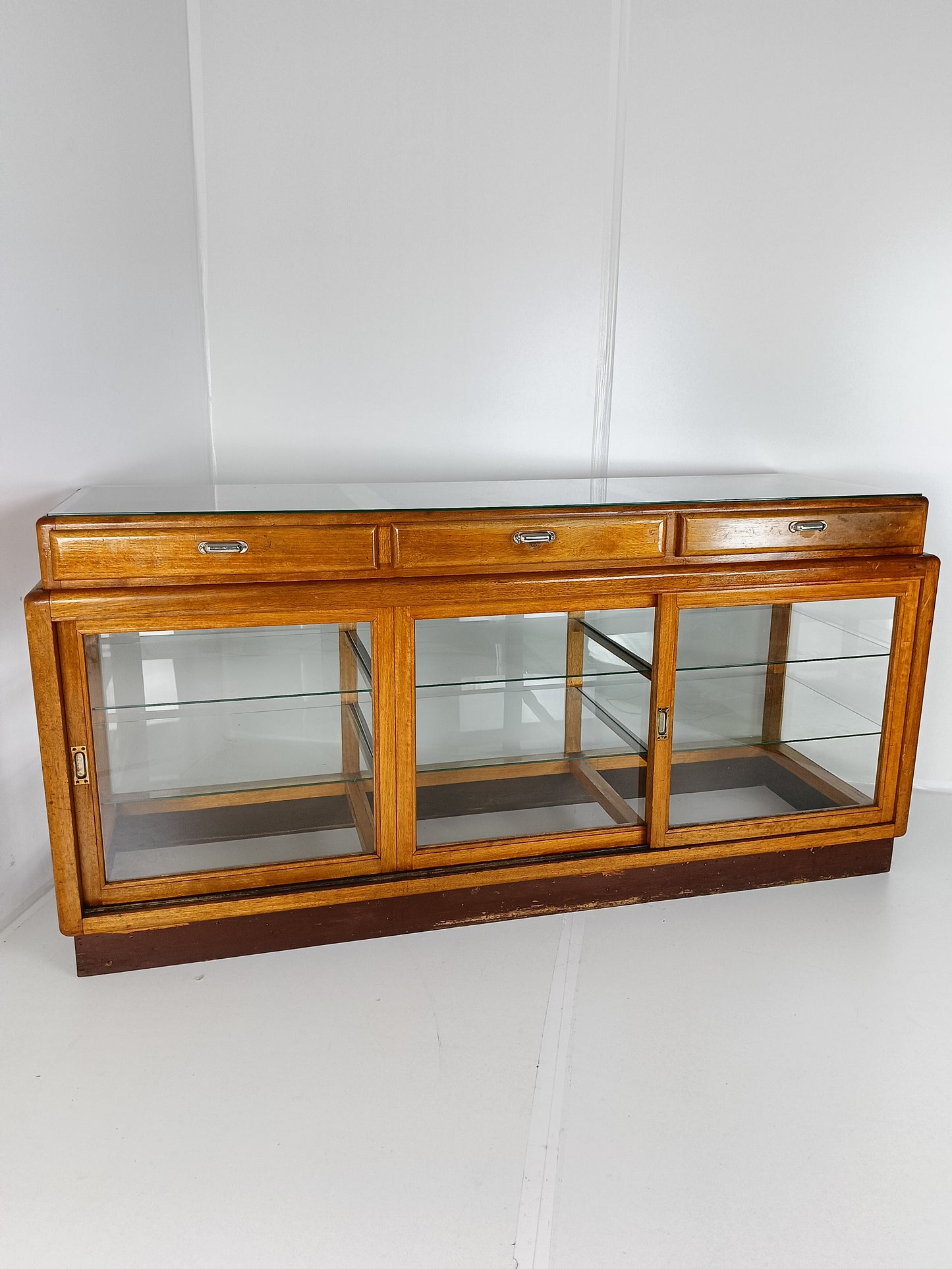 Elegant Antique Store Display With Glass Shelves