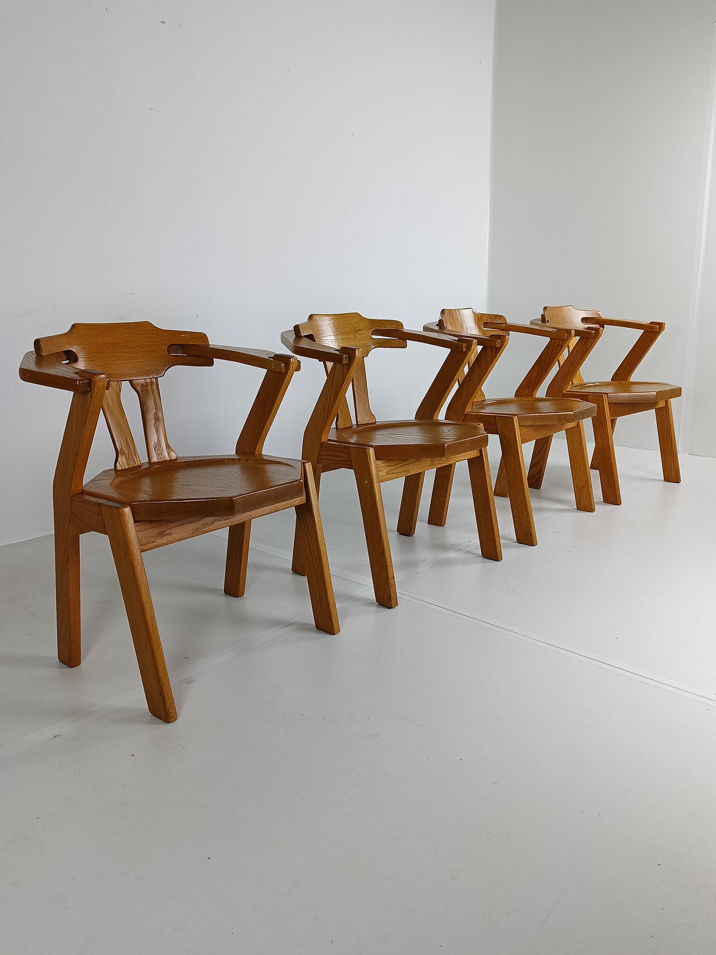 Set Of Four Brutalist Chairs With Armrests