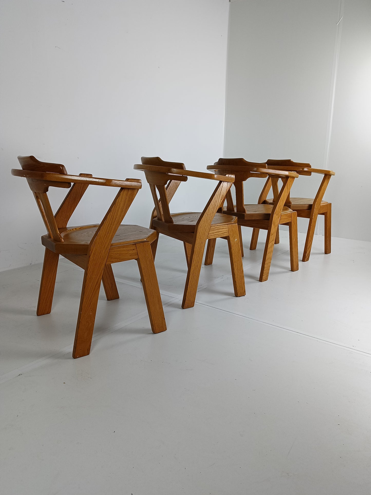 Set Of Four Brutalist Chairs With Armrests