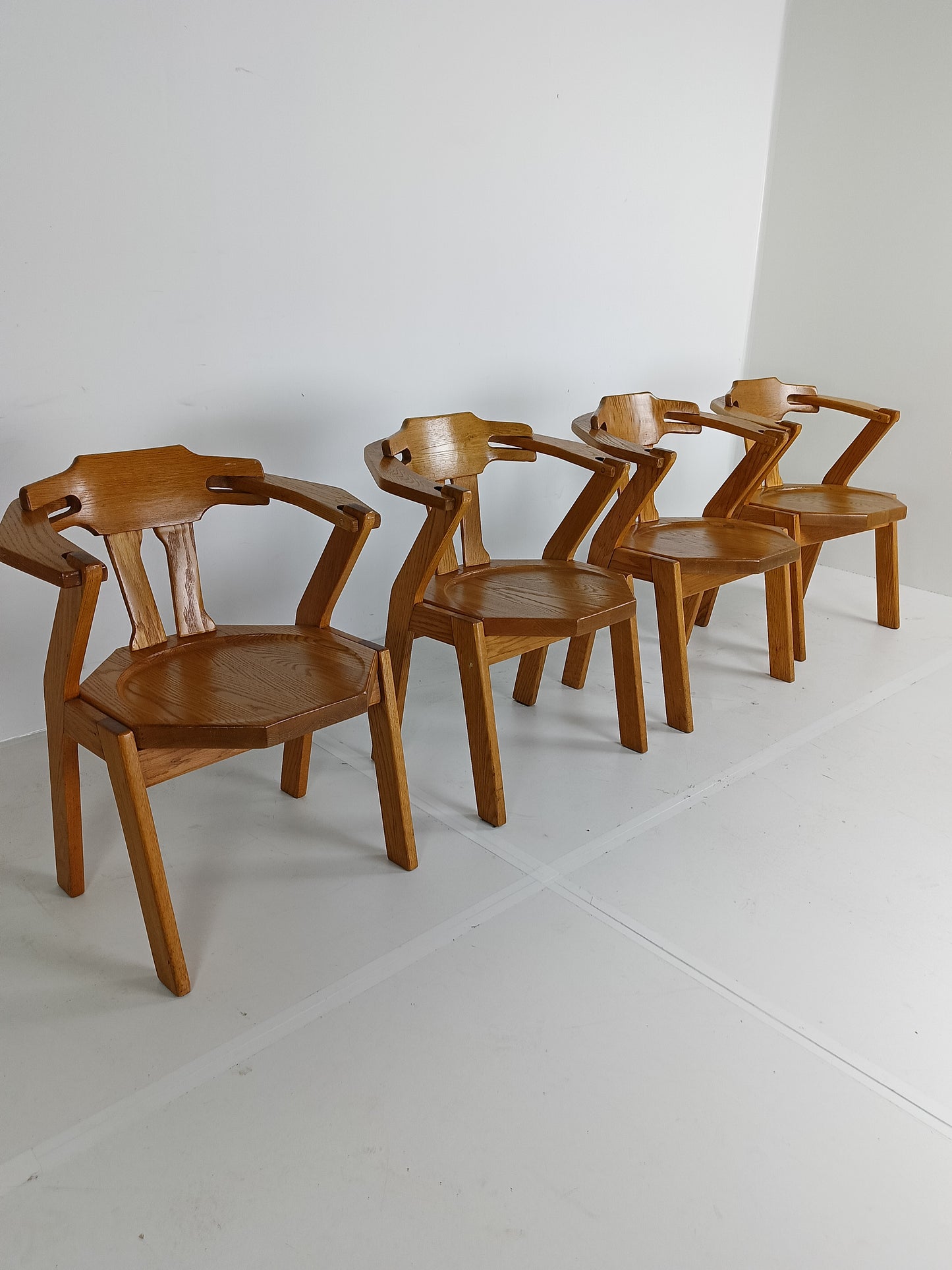 Set Of Four Brutalist Chairs With Armrests