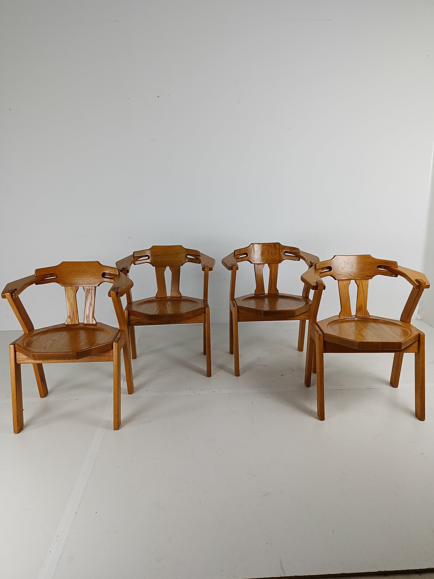 Set Of Four Brutalist Chairs With Armrests