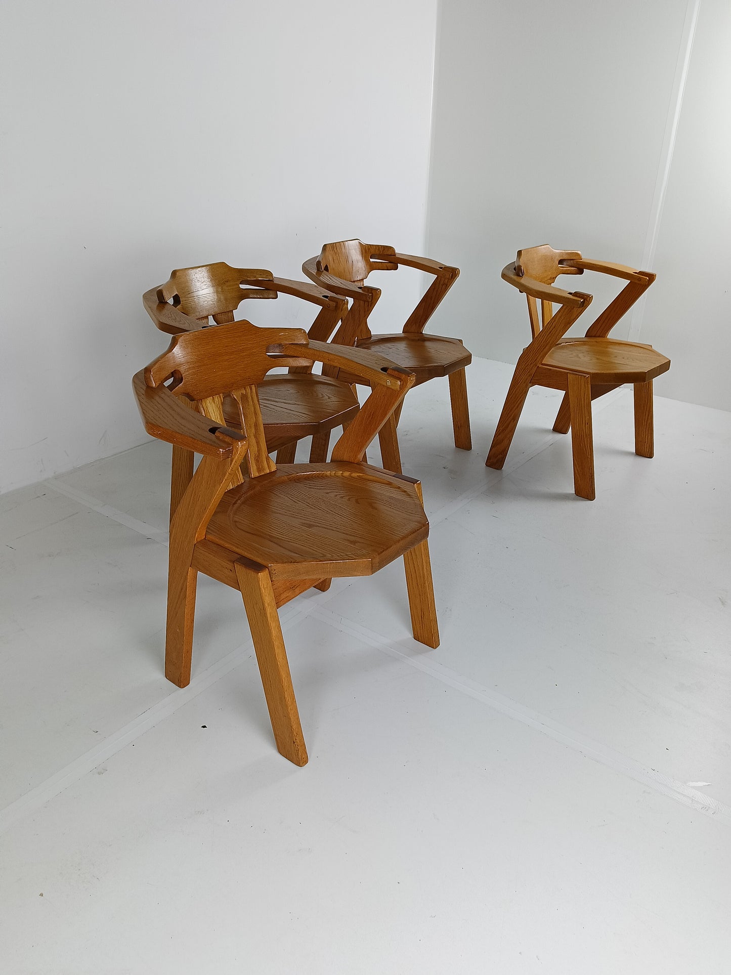 Set Of Four Brutalist Chairs With Armrests