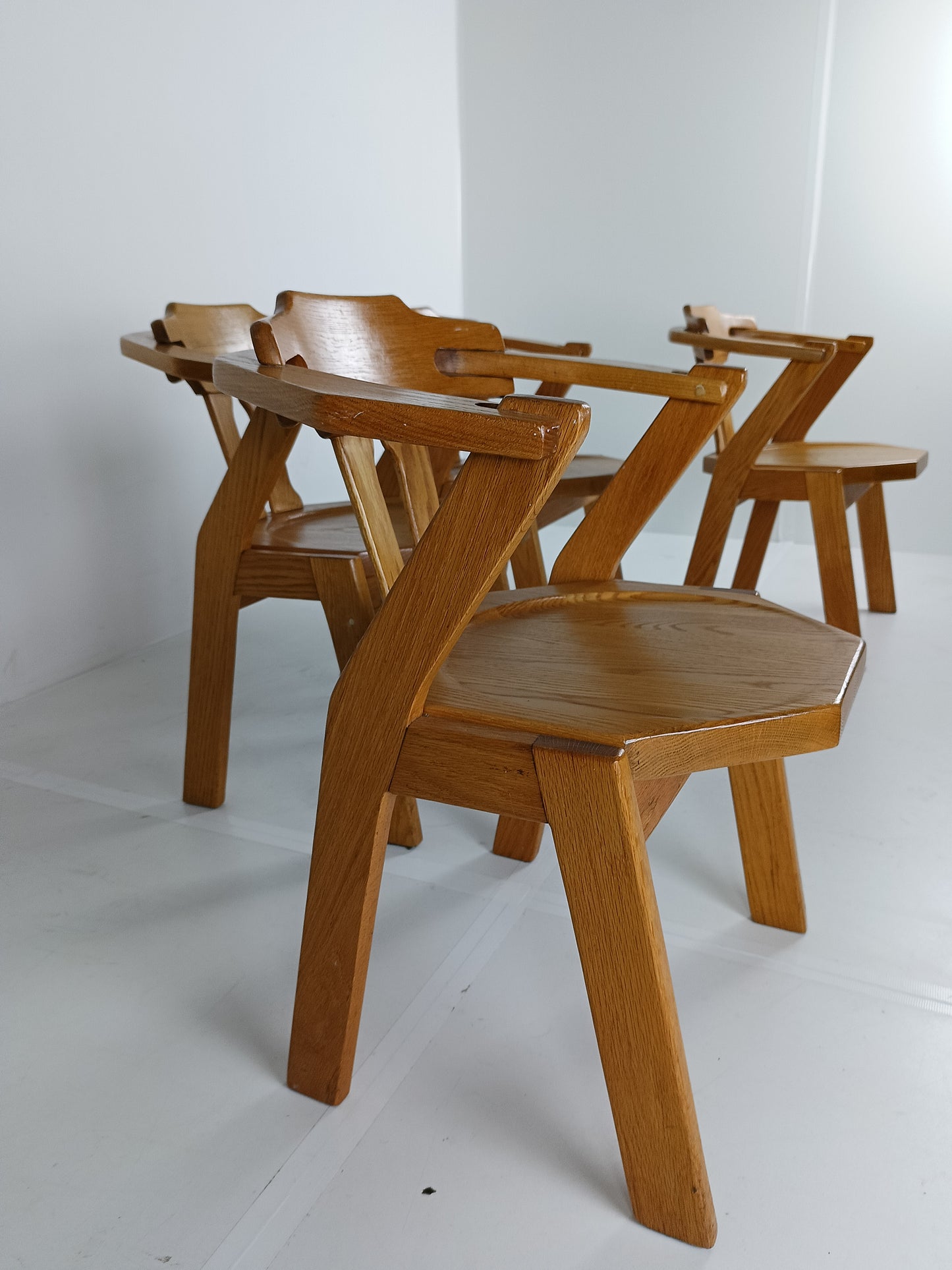 Set Of Four Brutalist Chairs With Armrests