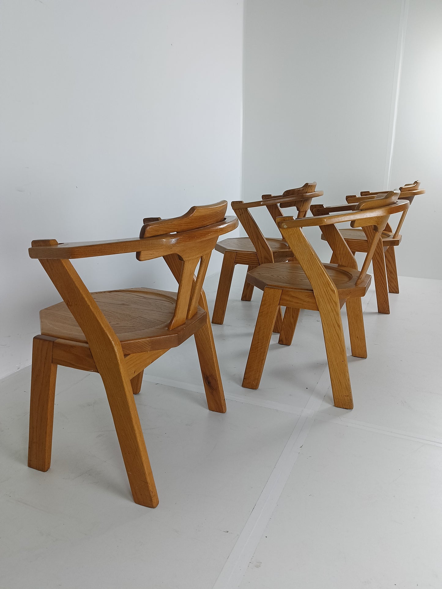 Set Of Four Brutalist Chairs With Armrests