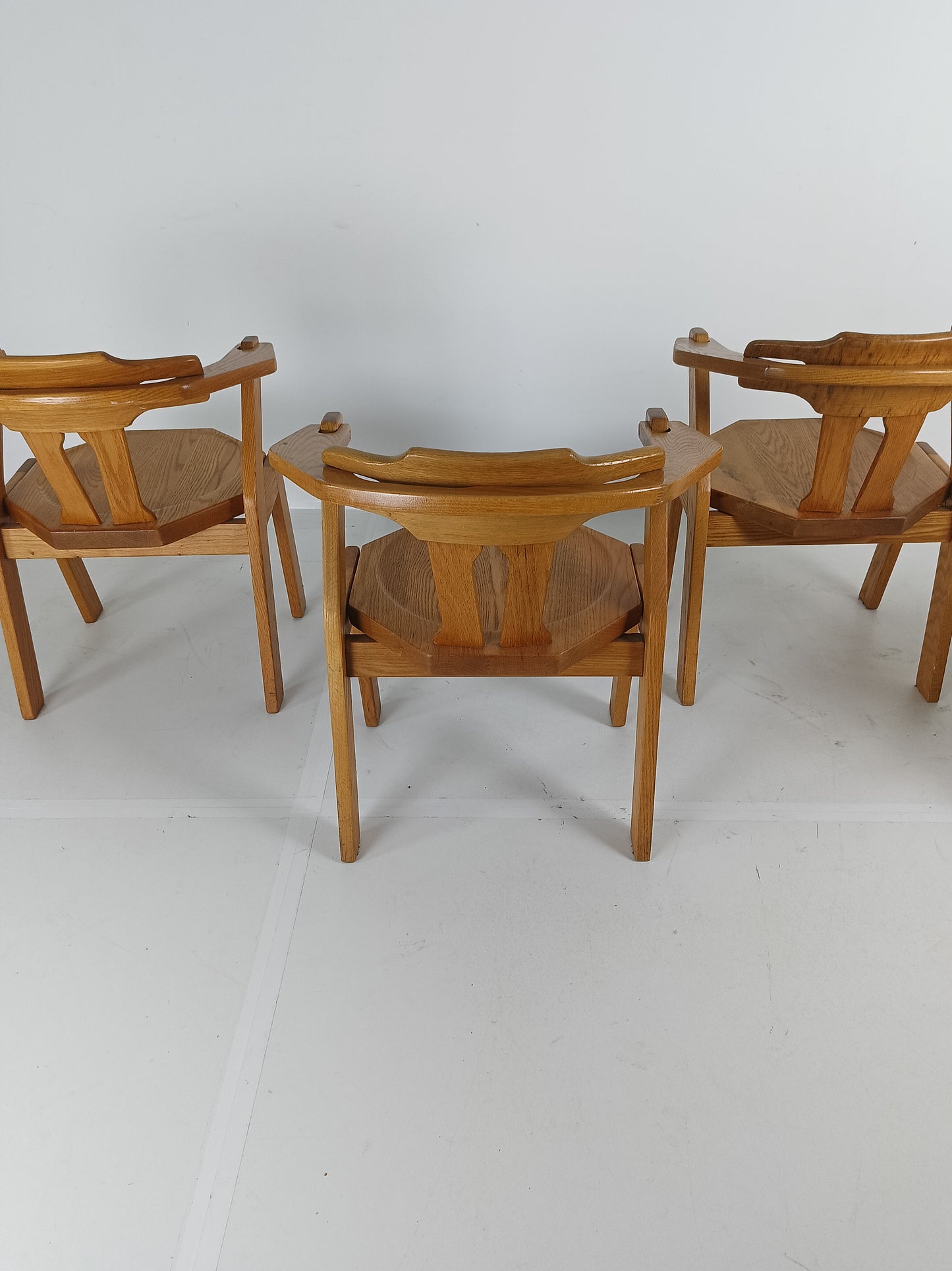 Set Of Four Brutalist Chairs With Armrests