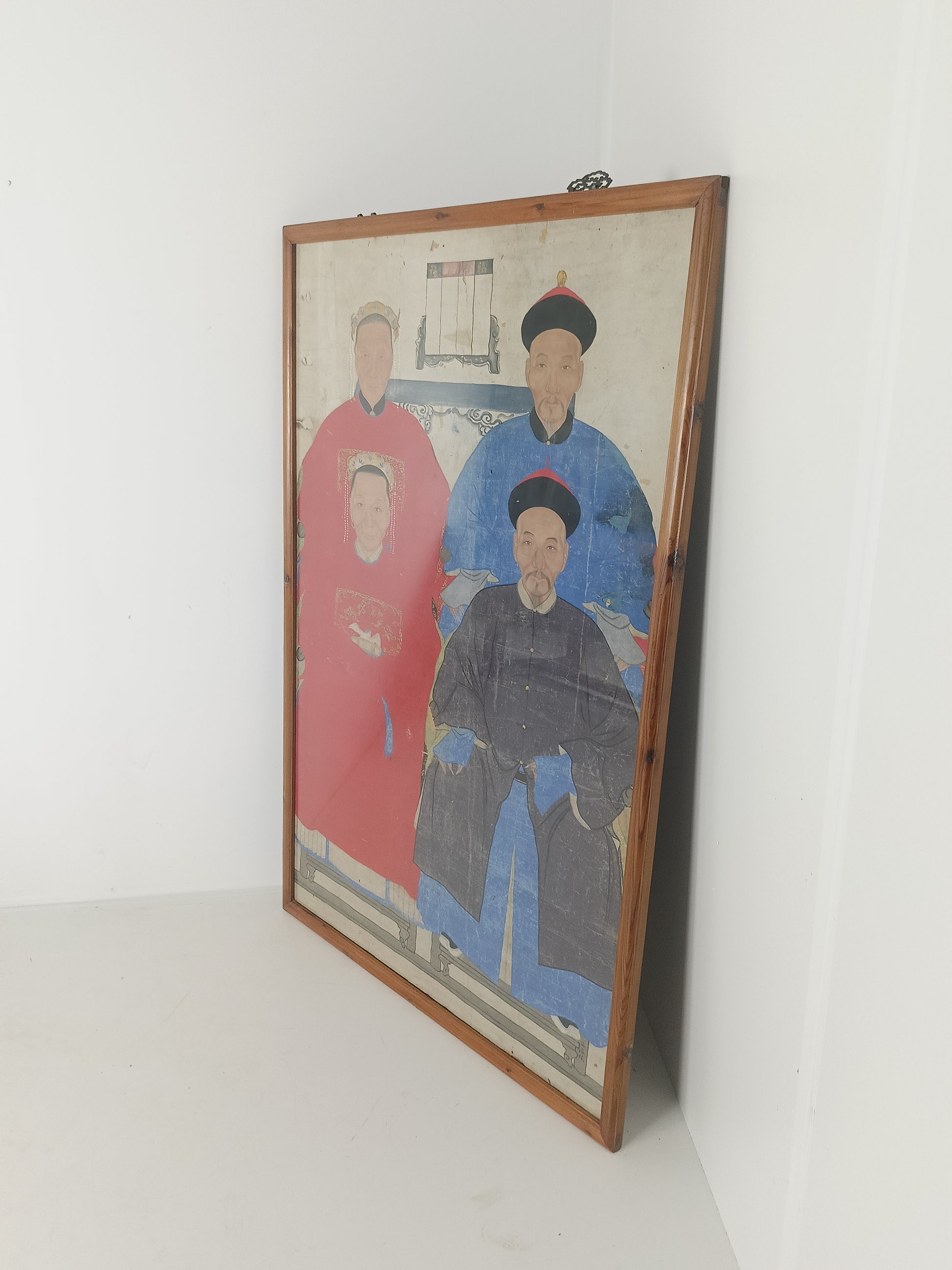 A framed Chinese ancestral portrait is a traditional hand-painted A framed Chinese ancestral portrait is a traditional hand-painted