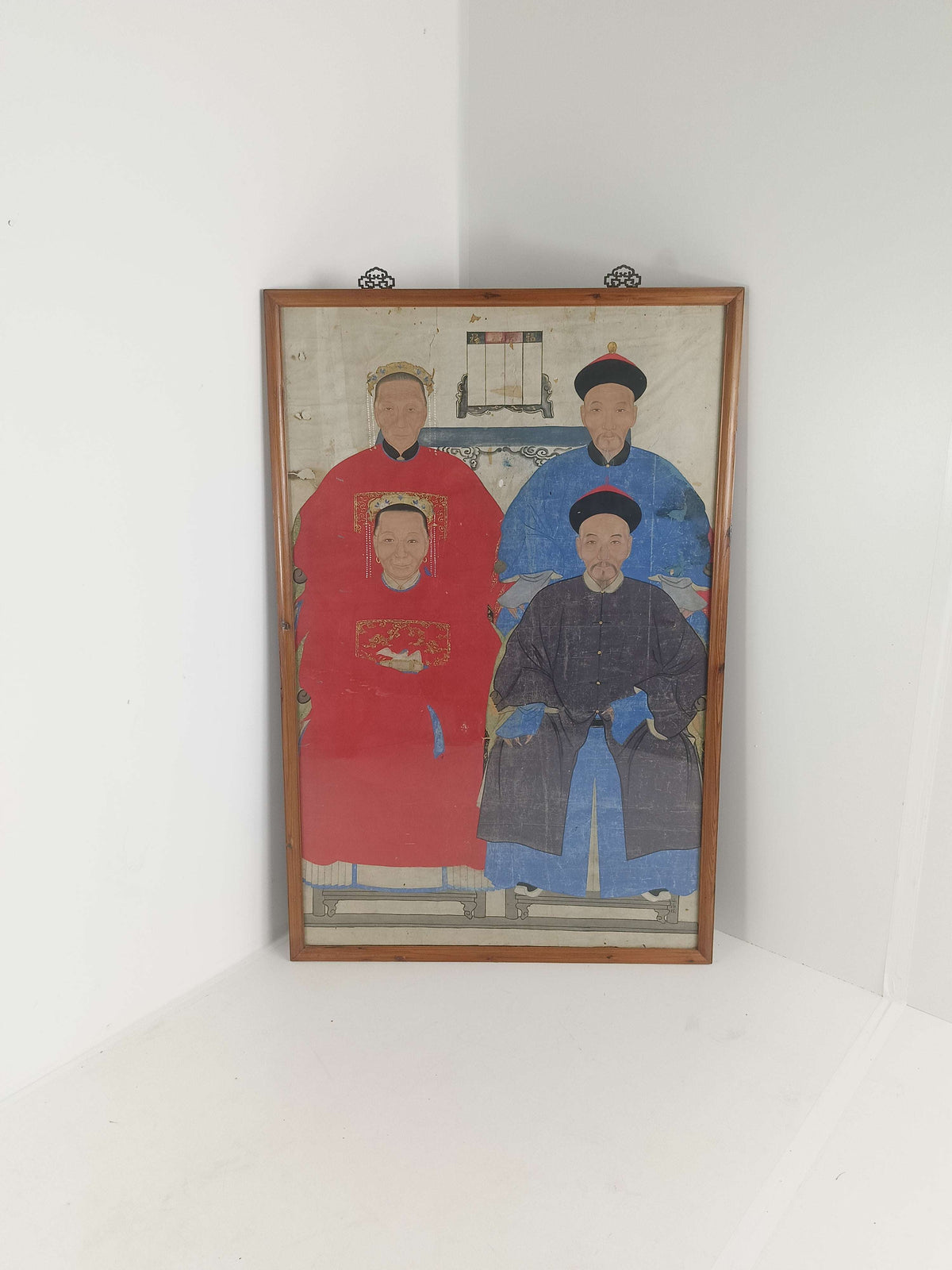 A framed Chinese ancestral portrait is a traditional hand-painted A framed Chinese ancestral portrait is a traditional hand-painted