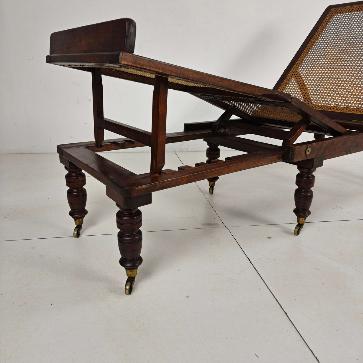 Late 19th Century English Oak Campaign Daybed with Original Cane Webbing Late 19th Century English Oak Campaign Daybed with Original Cane Webbing