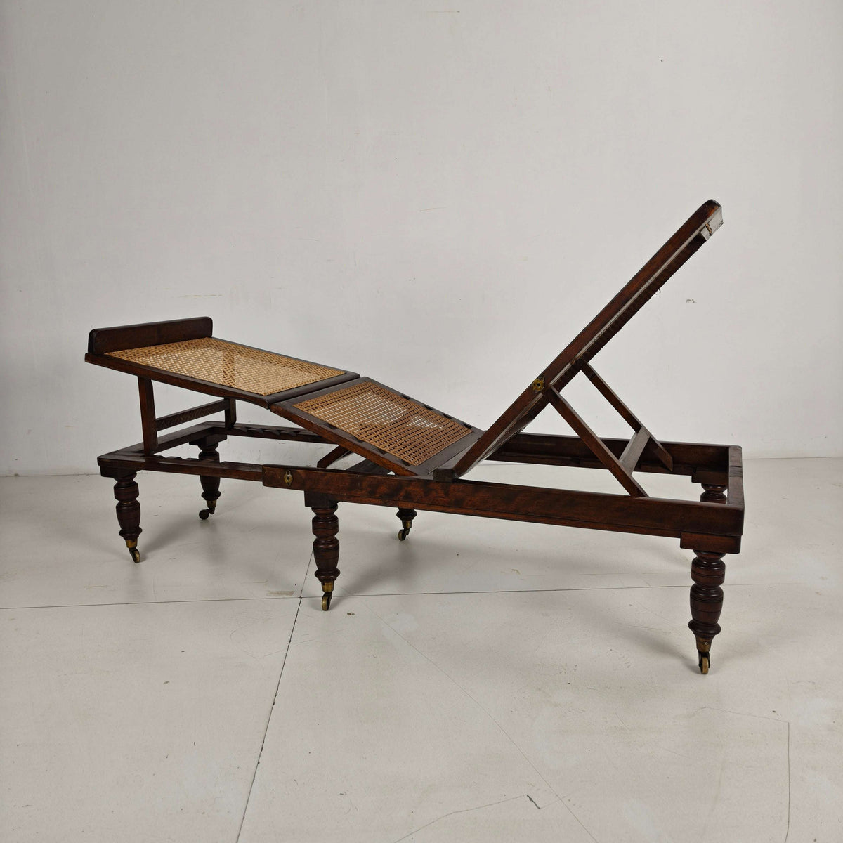 Late 19th Century English Oak Campaign Daybed with Original Cane Webbing Late 19th Century English Oak Campaign Daybed with Original Cane Webbing