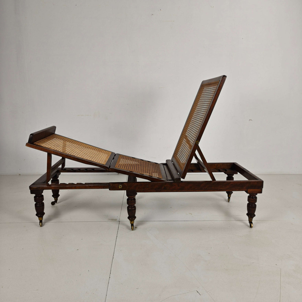 Late 19th Century English Oak Campaign Daybed with Original Cane Webbing Late 19th Century English Oak Campaign Daybed with Original Cane Webbing