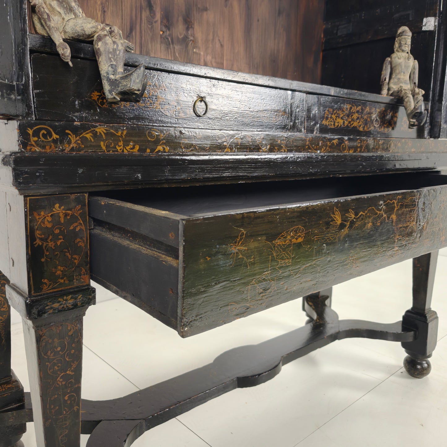 A rare early 18th-century Dutch japanned chinoiserie cabinet, circa 1700