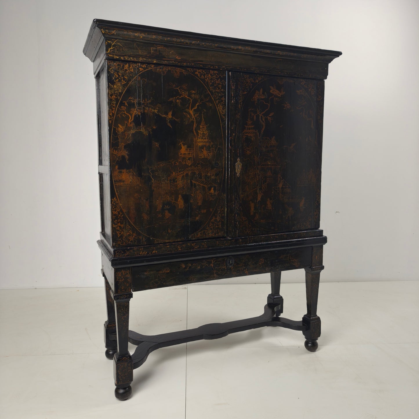 A rare early 18th-century Dutch japanned chinoiserie cabinet, circa 1700