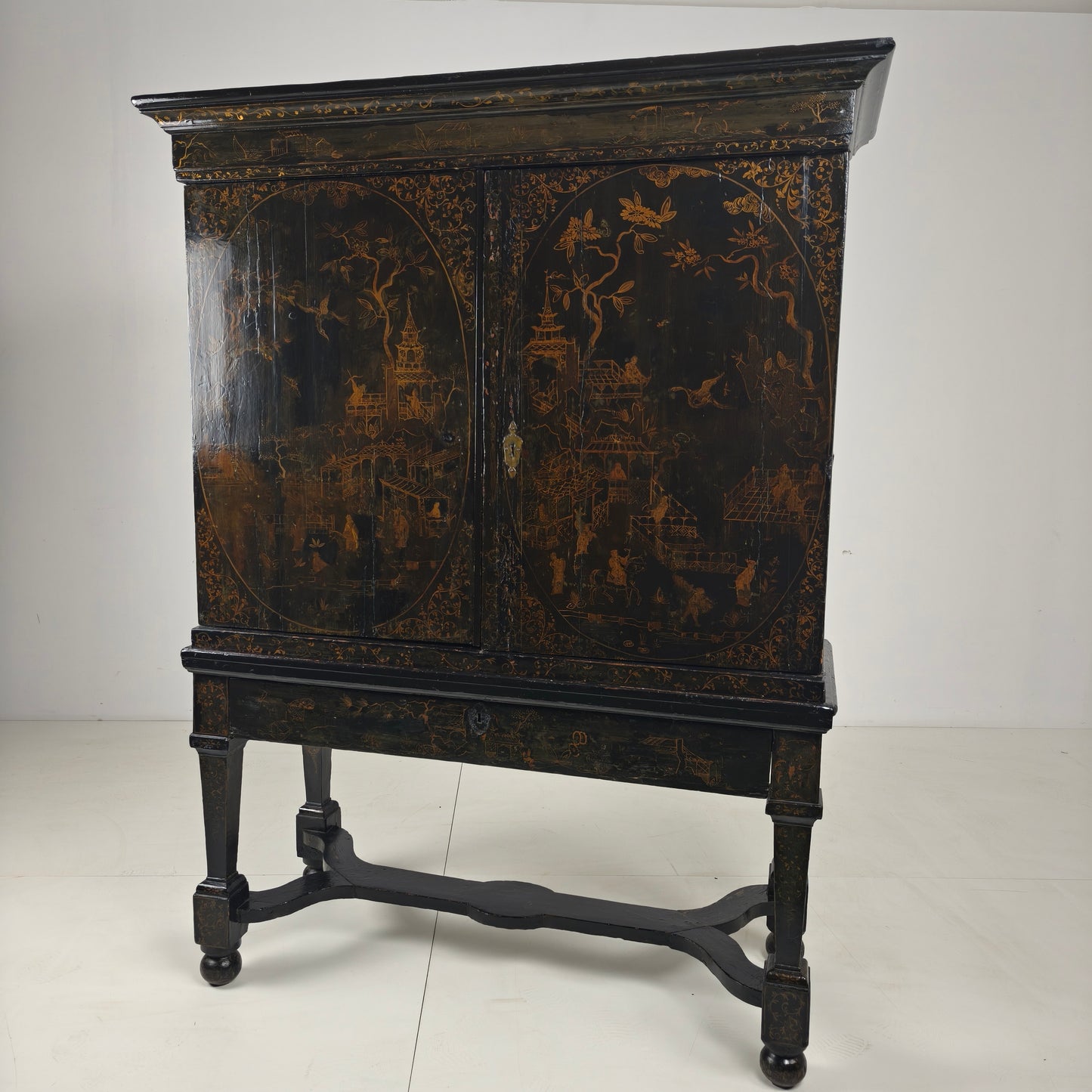 A rare early 18th-century Dutch japanned chinoiserie cabinet, circa 1700