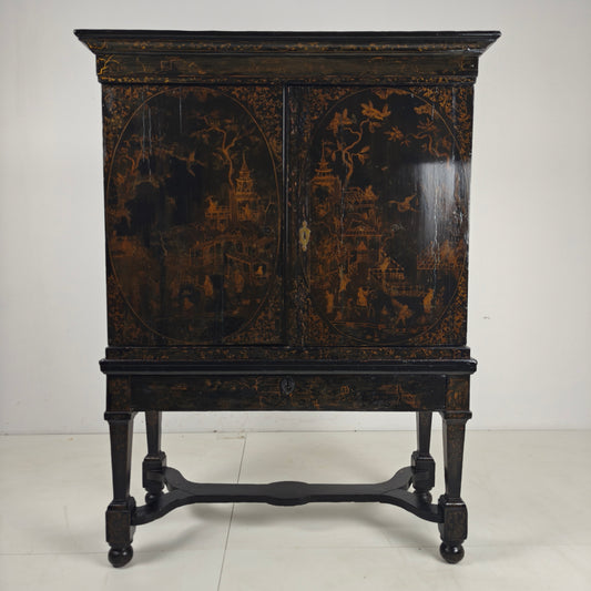 A rare early 18th-century Dutch japanned chinoiserie cabinet, circa 1700