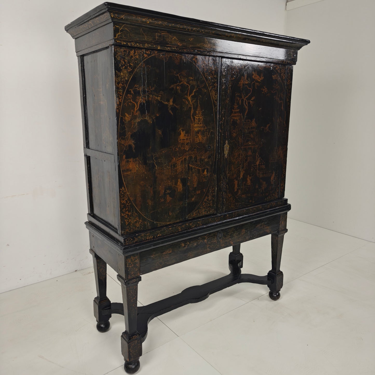 A rare early 18th-century Dutch japanned chinoiserie cabinet, circa 1700