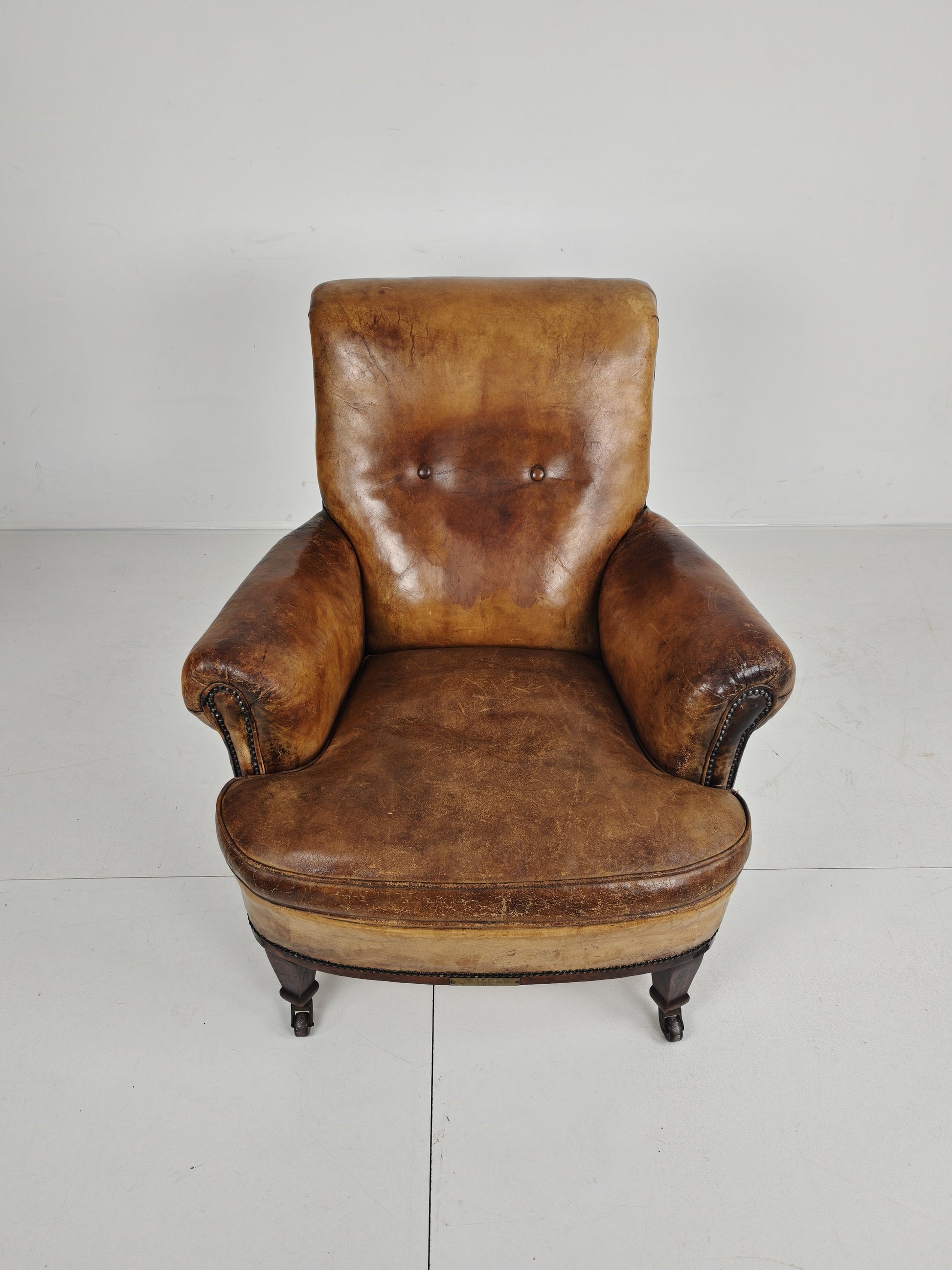 A Classic English Leather Club Chair From 1912 A Classic English Leather Club Chair From 1912