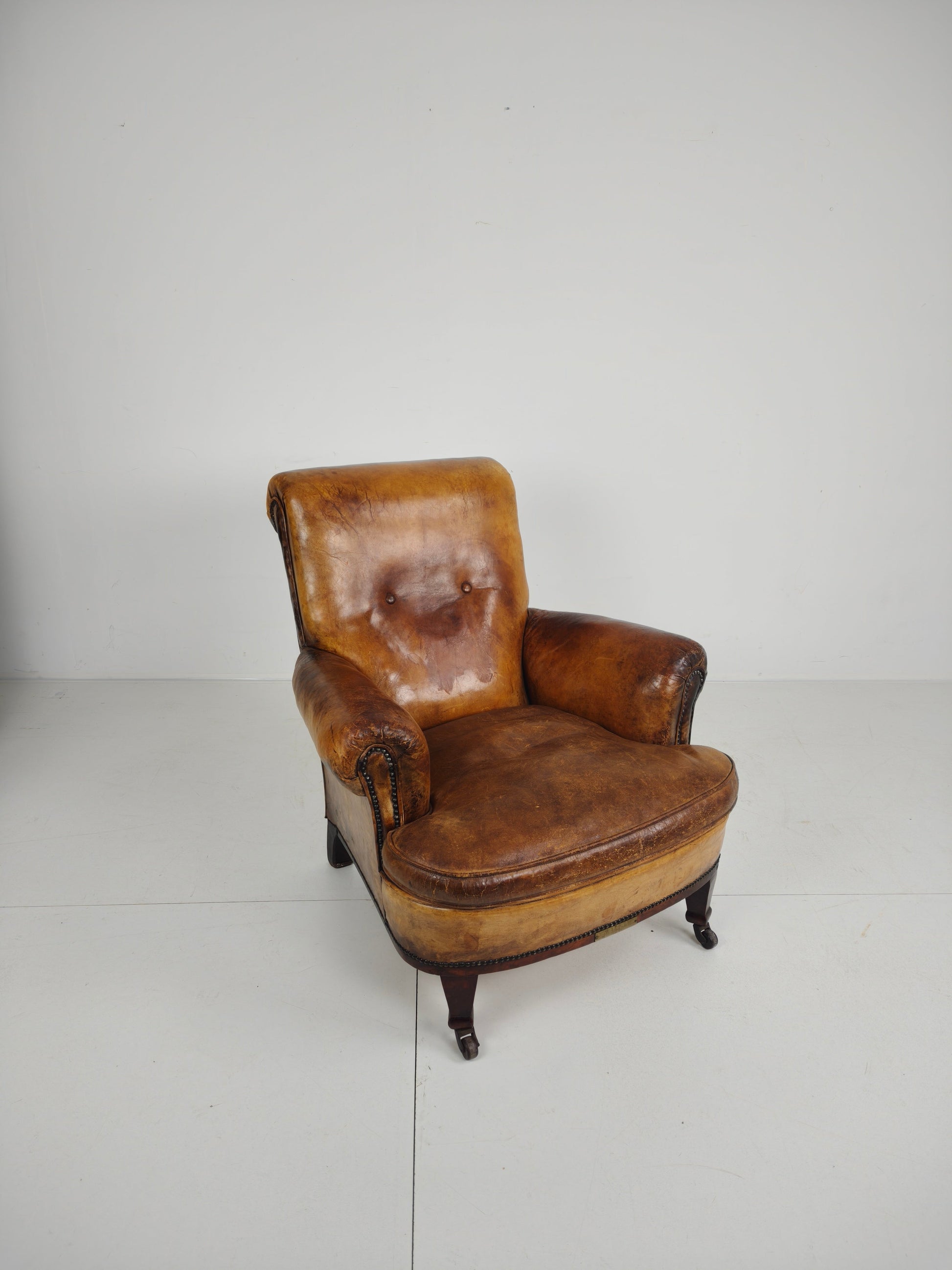 A Classic English Leather Club Chair From 1912 A Classic English Leather Club Chair From 1912