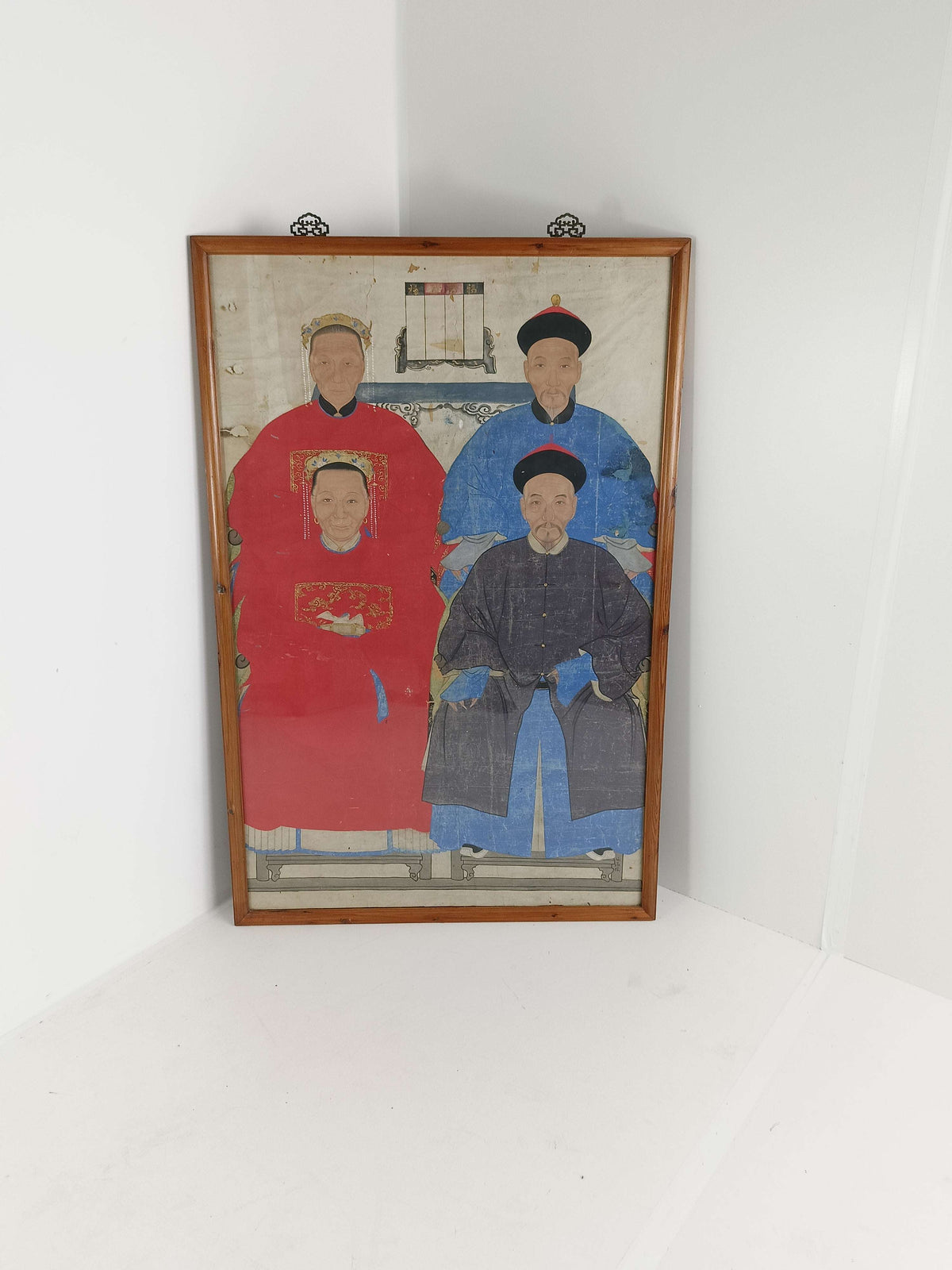 A framed Chinese ancestral portrait is a traditional hand-painted A framed Chinese ancestral portrait is a traditional hand-painted