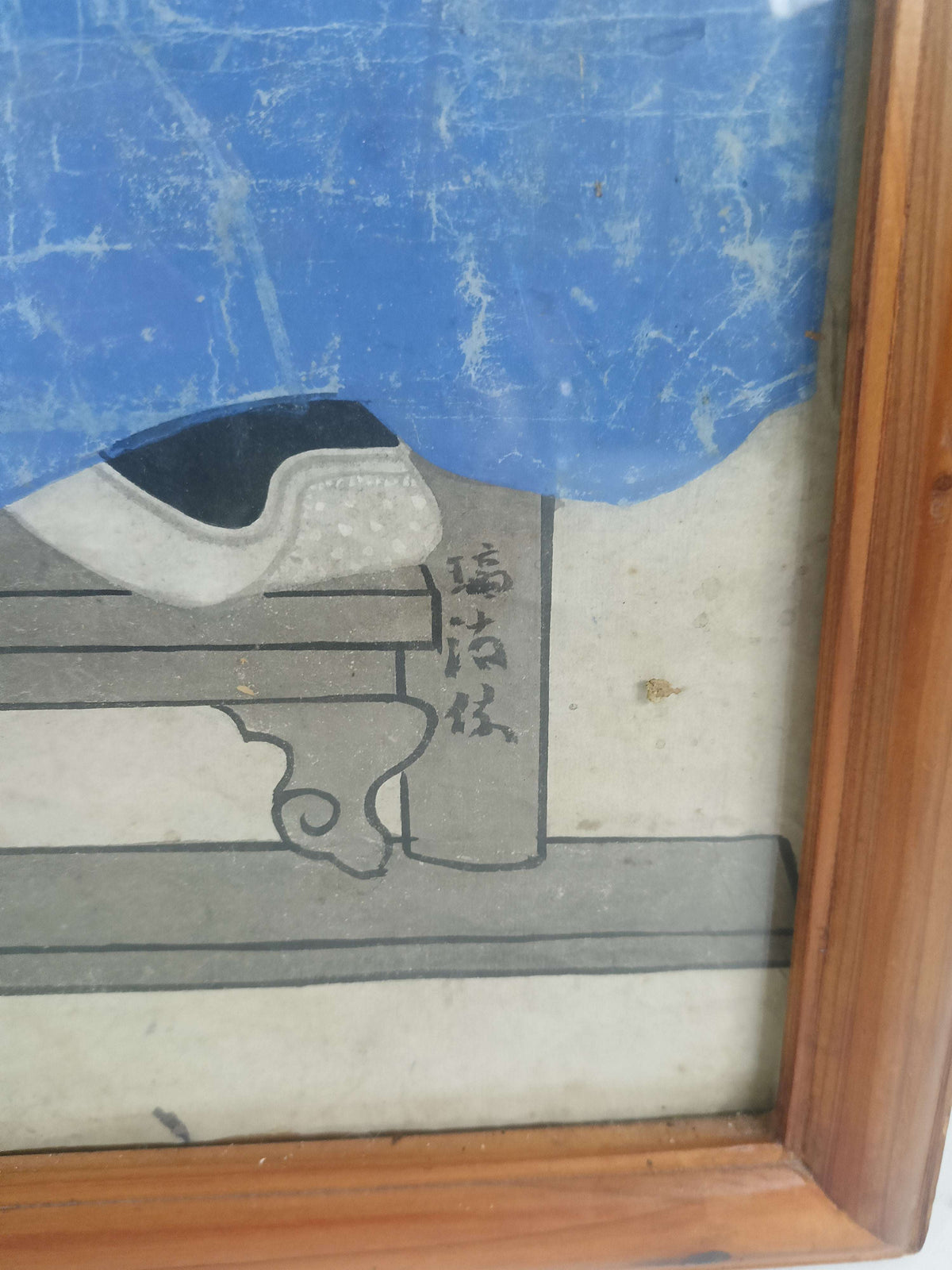 A framed Chinese ancestral portrait is a traditional hand-painted A framed Chinese ancestral portrait is a traditional hand-painted