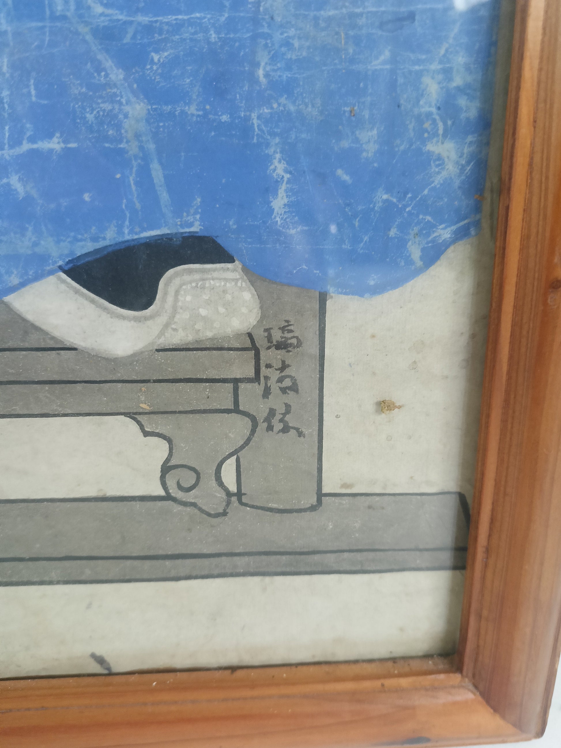 A framed Chinese ancestral portrait is a traditional hand-painted A framed Chinese ancestral portrait is a traditional hand-painted
