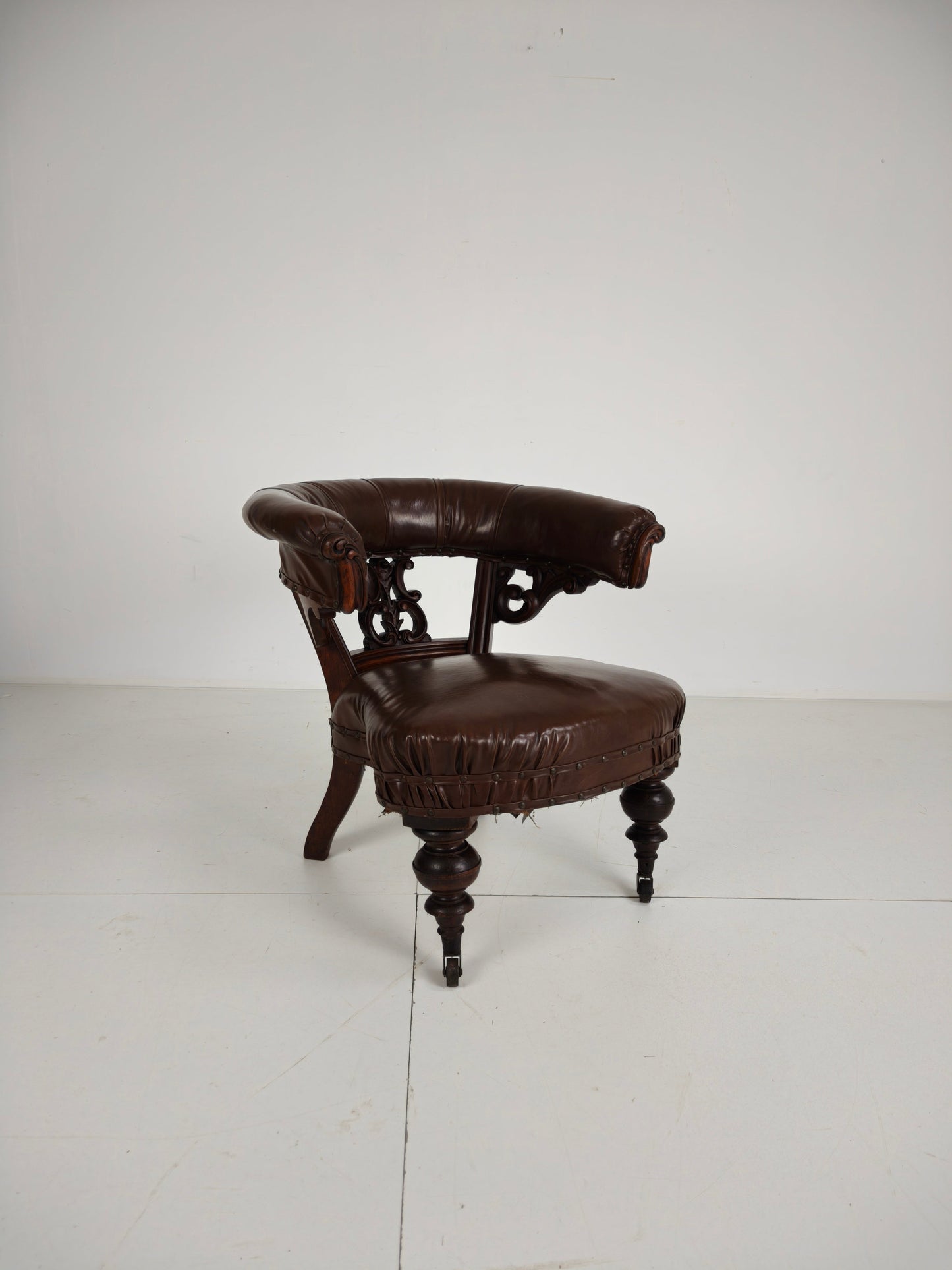 Antique Leather Armchair by Robson & Son – Carved Wood & Castors, Newcastle Antique Leather Armchair by Robson & Son – Carved Wood & Castors, Newcastle