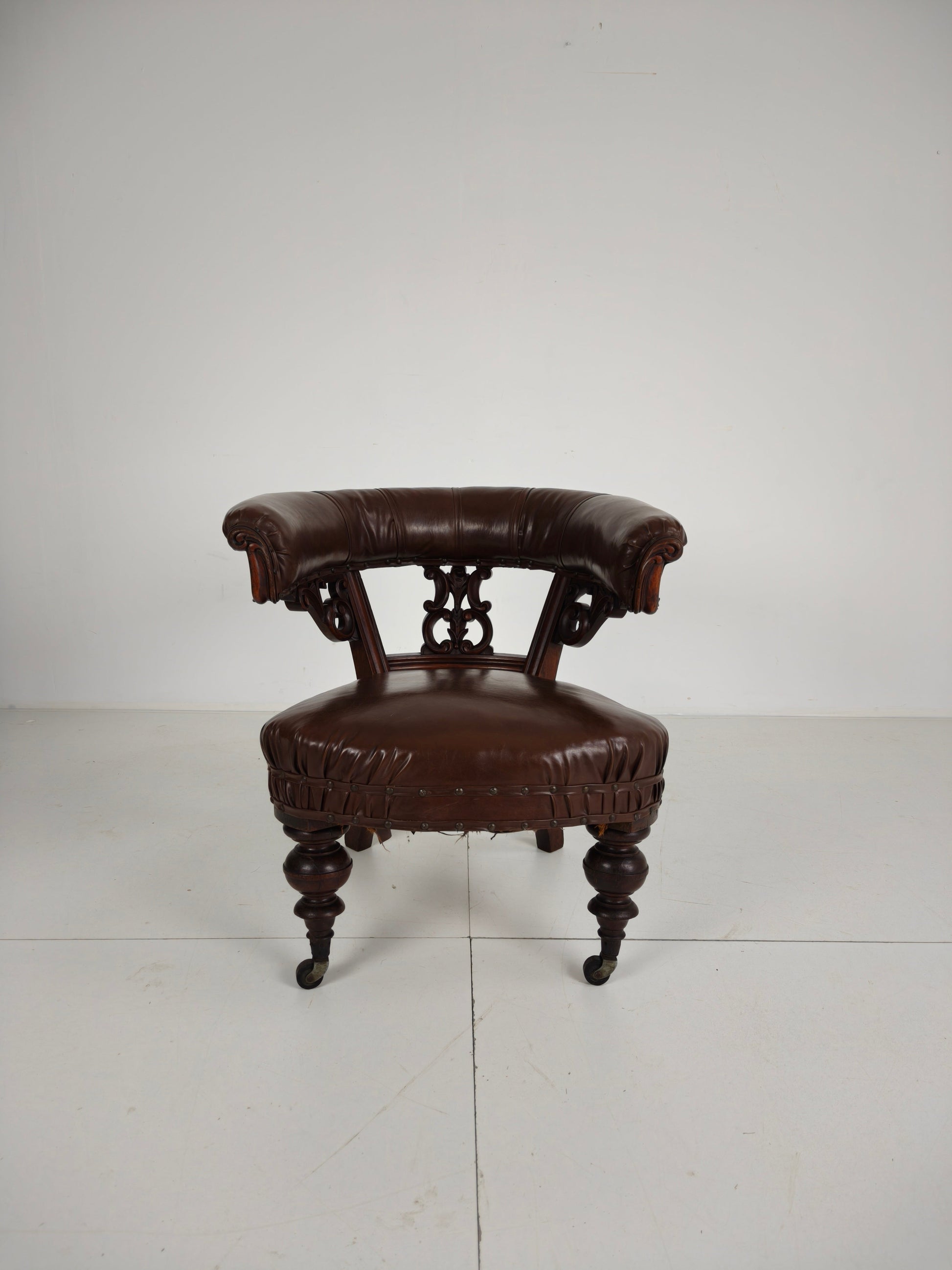 Antique Leather Armchair by Robson & Son – Carved Wood & Castors, Newcastle Antique Leather Armchair by Robson & Son – Carved Wood & Castors, Newcastle
