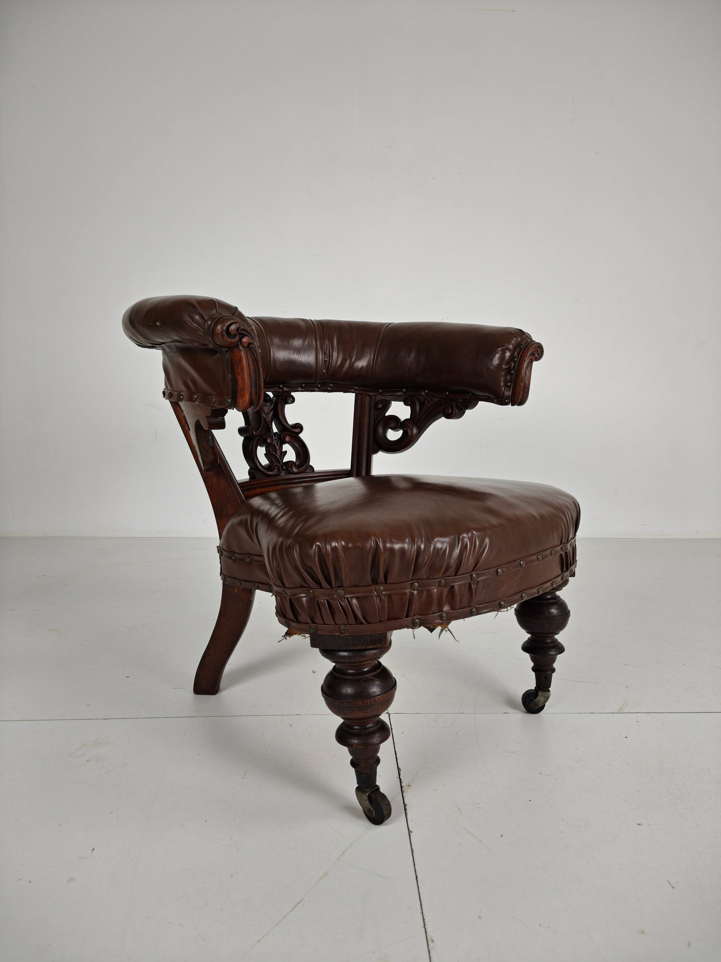 Antique Leather Armchair by Robson & Son – Carved Wood & Castors, Newcastle Antique Leather Armchair by Robson & Son – Carved Wood & Castors, Newcastle