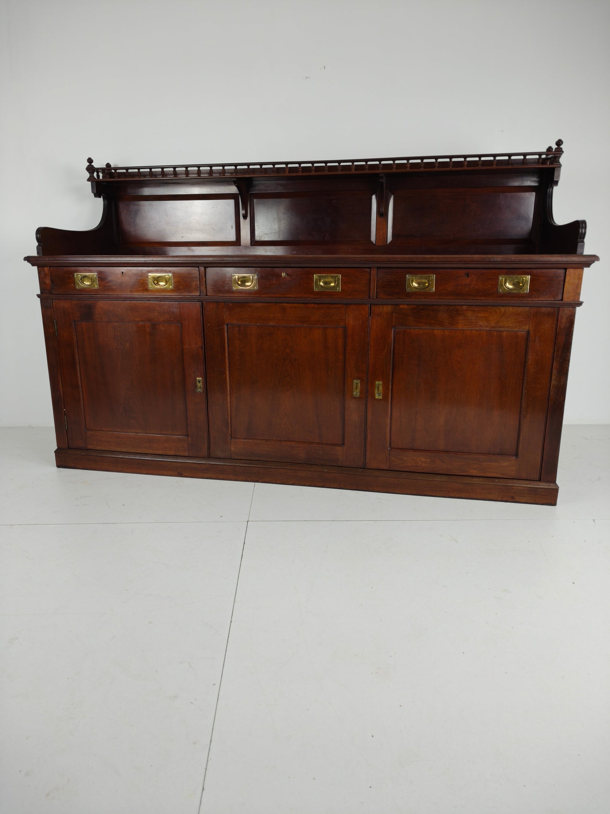 Early 20th-Century English Mahogany Dresser / Sideboard – Brass Campaign Hardware Early 20th-Century English Mahogany Dresser / Sideboard – Brass Campaign Hardware