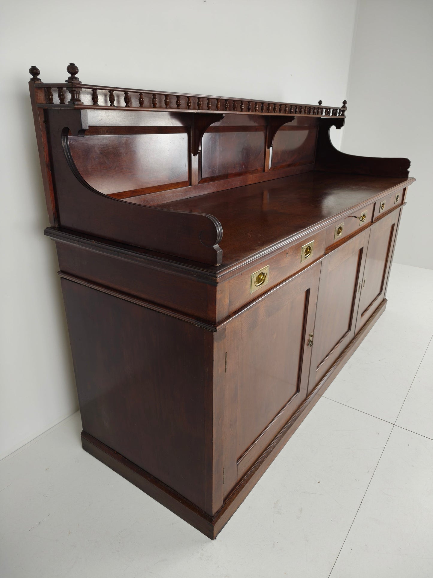 Early 20th-Century English Mahogany Dresser / Sideboard – Brass Campaign Hardware Early 20th-Century English Mahogany Dresser / Sideboard – Brass Campaign Hardware