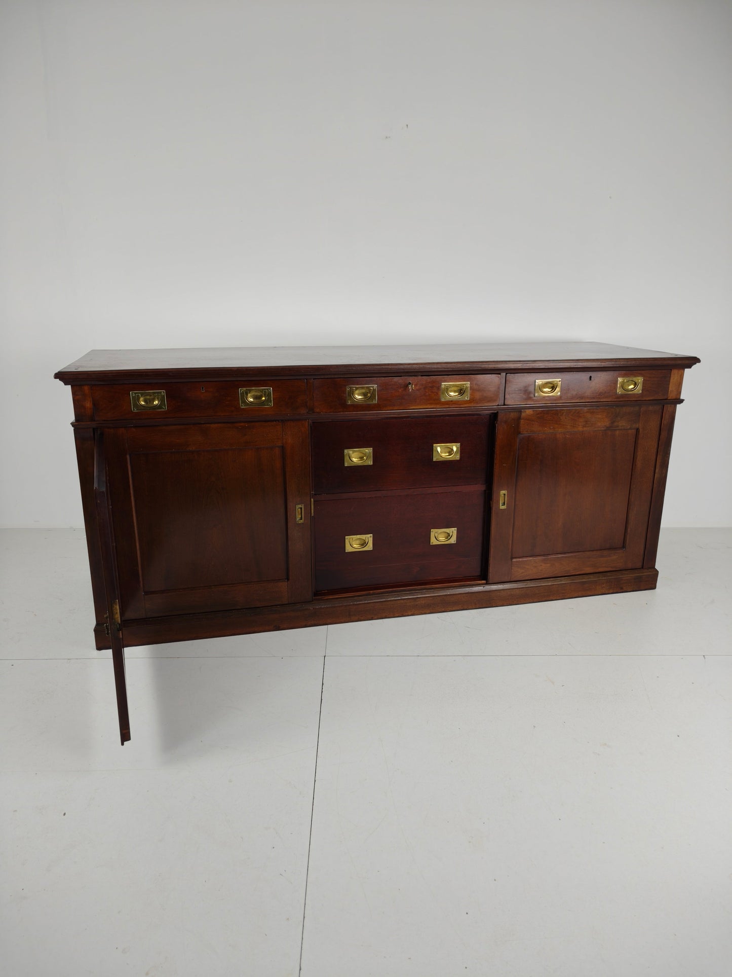 Early 20th-Century English Mahogany Dresser / Sideboard – Brass Campaign Hardware Early 20th-Century English Mahogany Dresser / Sideboard – Brass Campaign Hardware