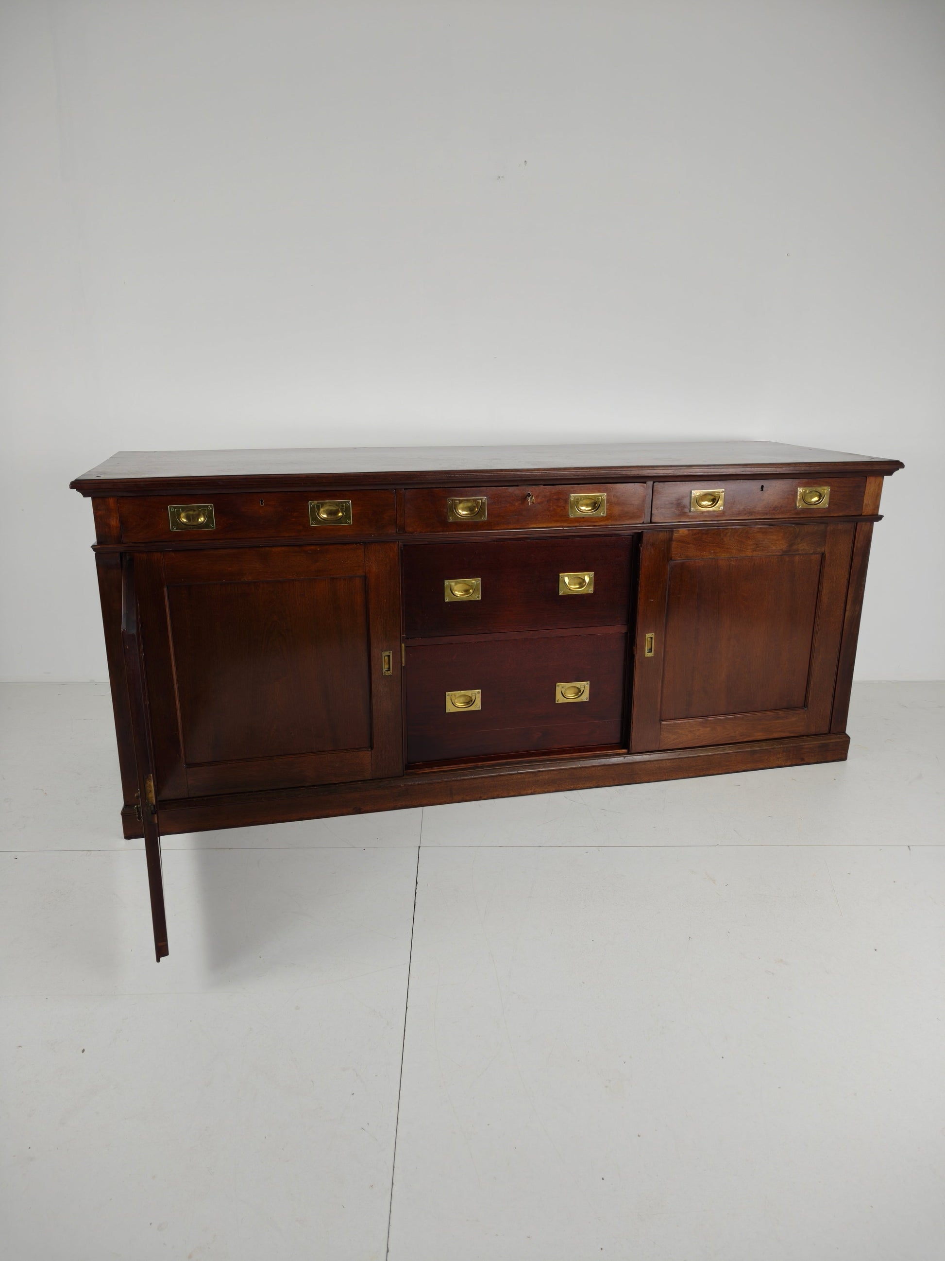 Early 20th-Century English Mahogany Dresser / Sideboard – Brass Campaign Hardware Early 20th-Century English Mahogany Dresser / Sideboard – Brass Campaign Hardware