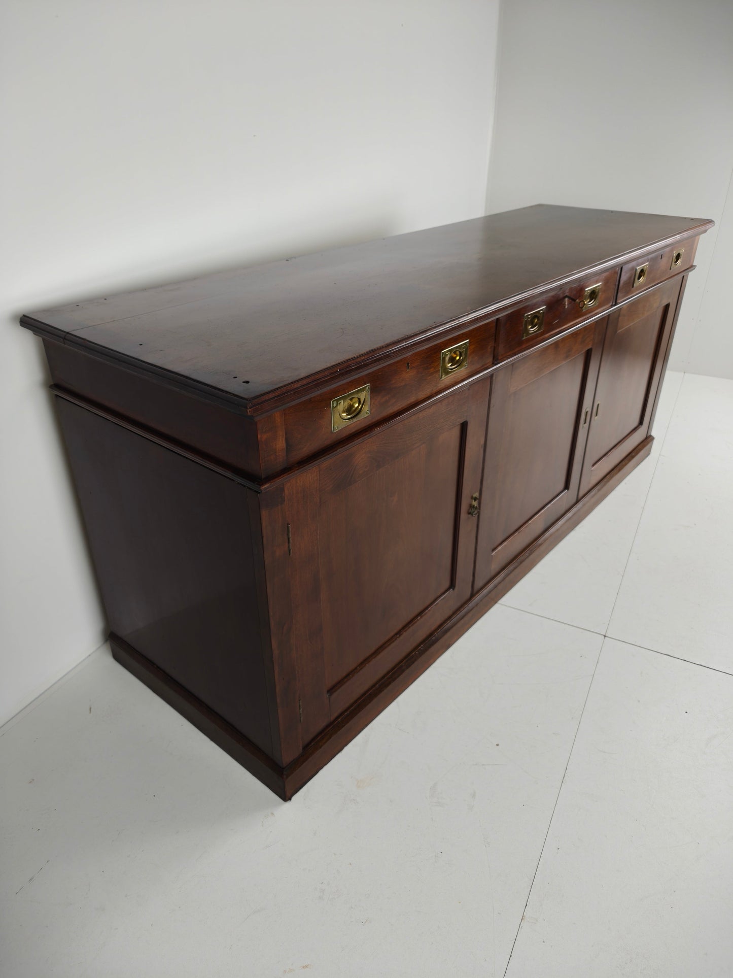 Early 20th-Century English Mahogany Dresser / Sideboard – Brass Campaign Hardware Early 20th-Century English Mahogany Dresser / Sideboard – Brass Campaign Hardware