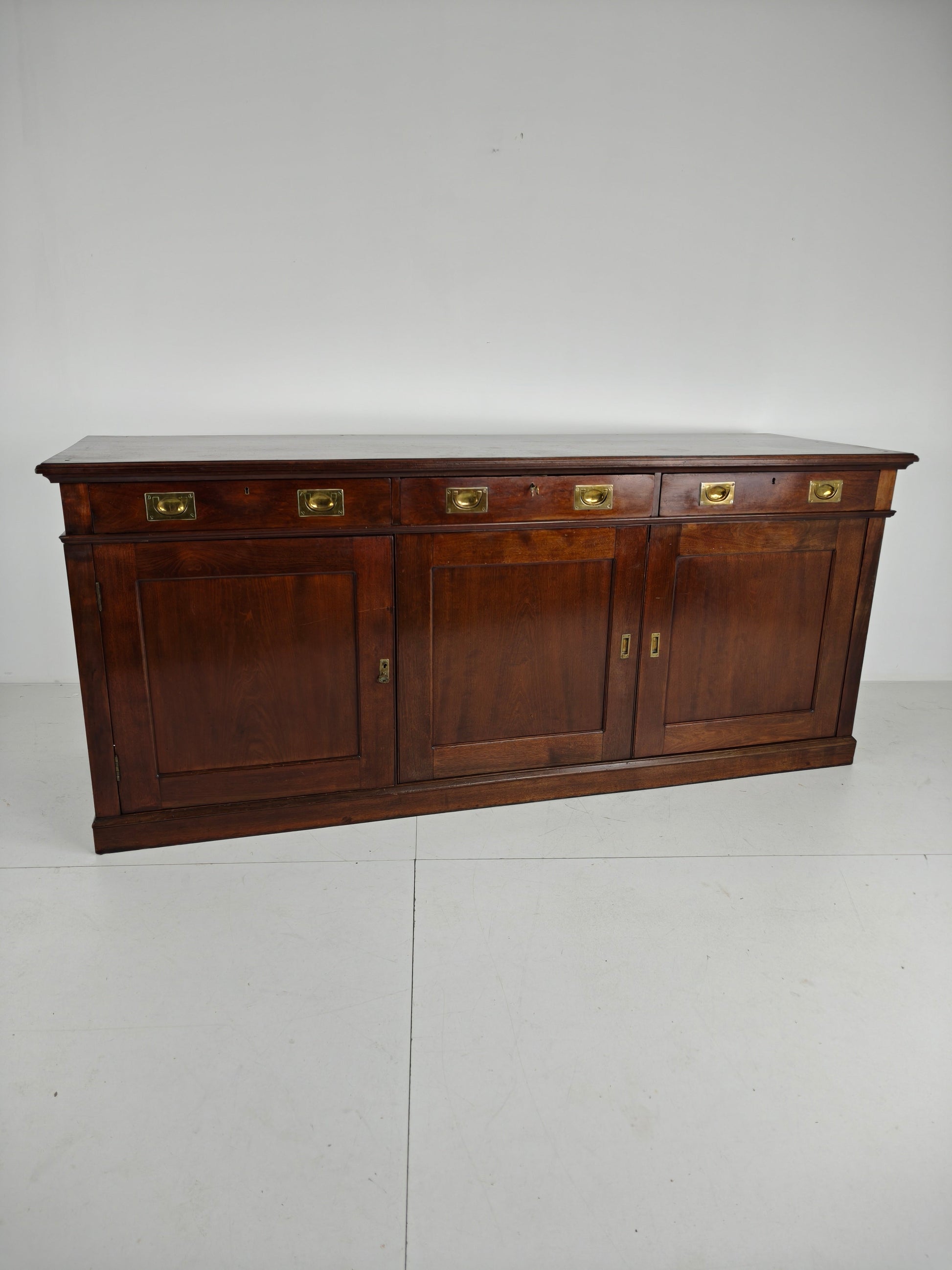 Early 20th-Century English Mahogany Dresser / Sideboard – Brass Campaign Hardware Early 20th-Century English Mahogany Dresser / Sideboard – Brass Campaign Hardware