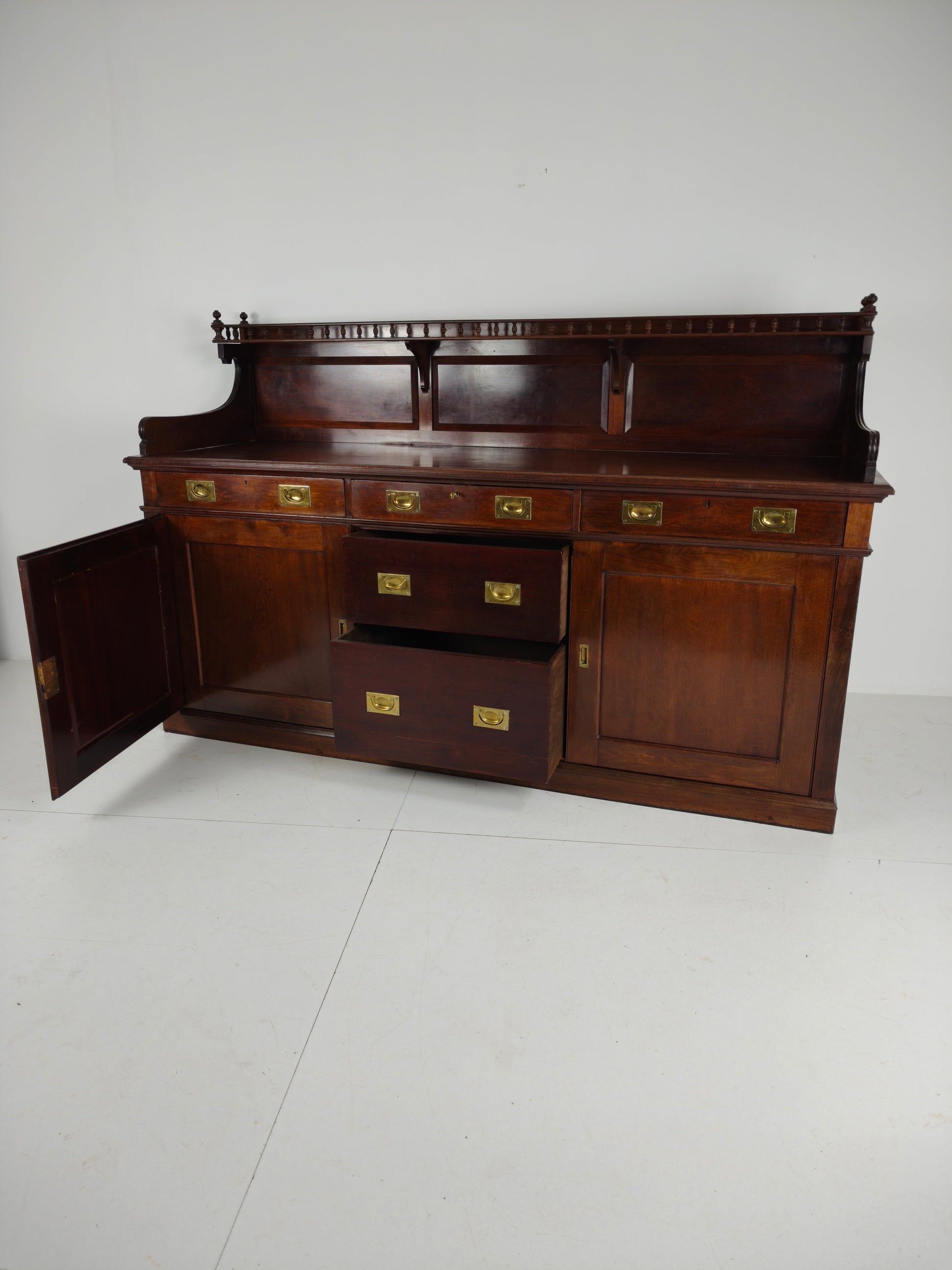 Early 20th-Century English Mahogany Dresser / Sideboard – Brass Campaign Hardware Early 20th-Century English Mahogany Dresser / Sideboard – Brass Campaign Hardware