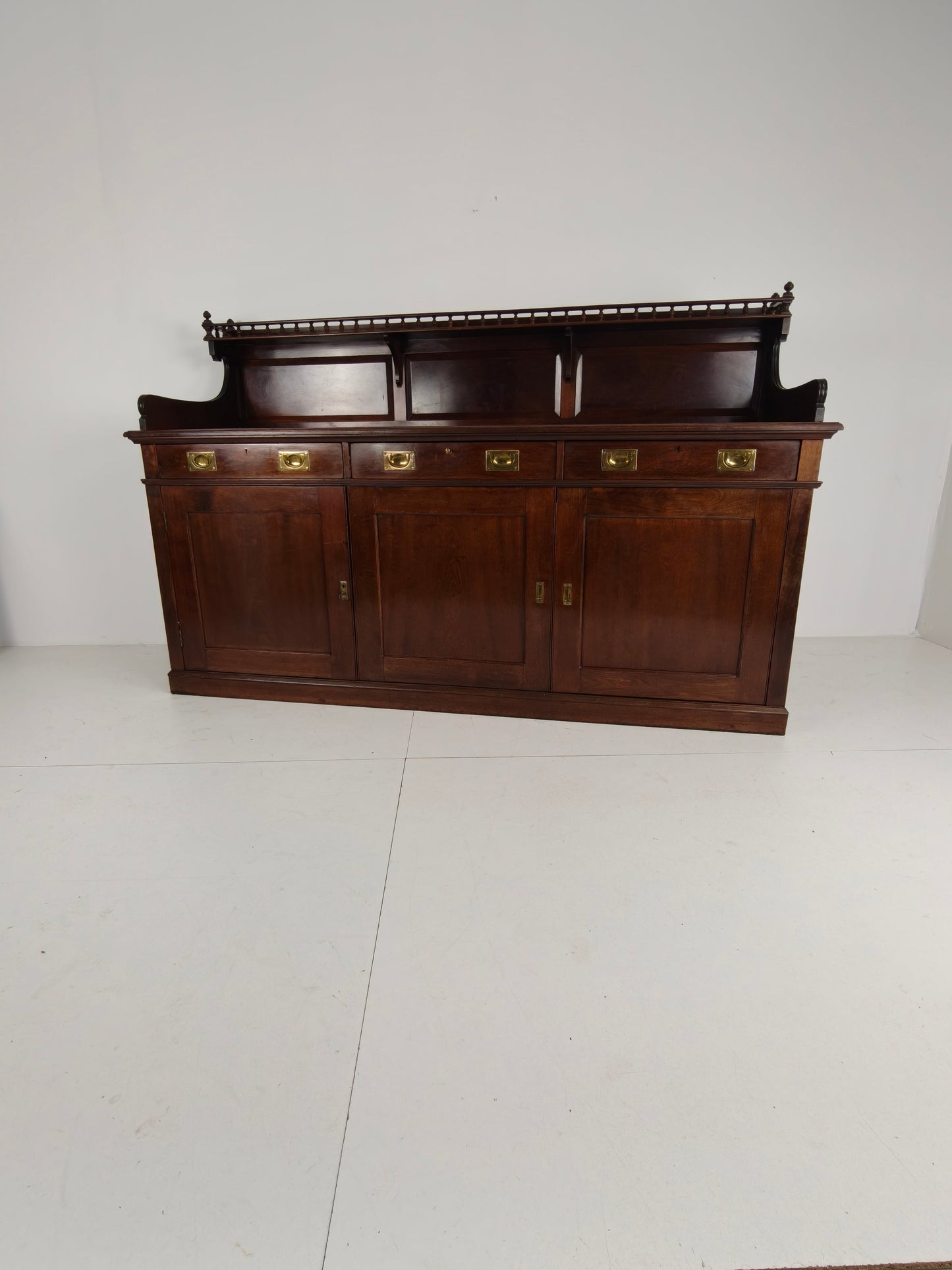 Early 20th-Century English Mahogany Dresser / Sideboard – Brass Campaign Hardware Early 20th-Century English Mahogany Dresser / Sideboard – Brass Campaign Hardware