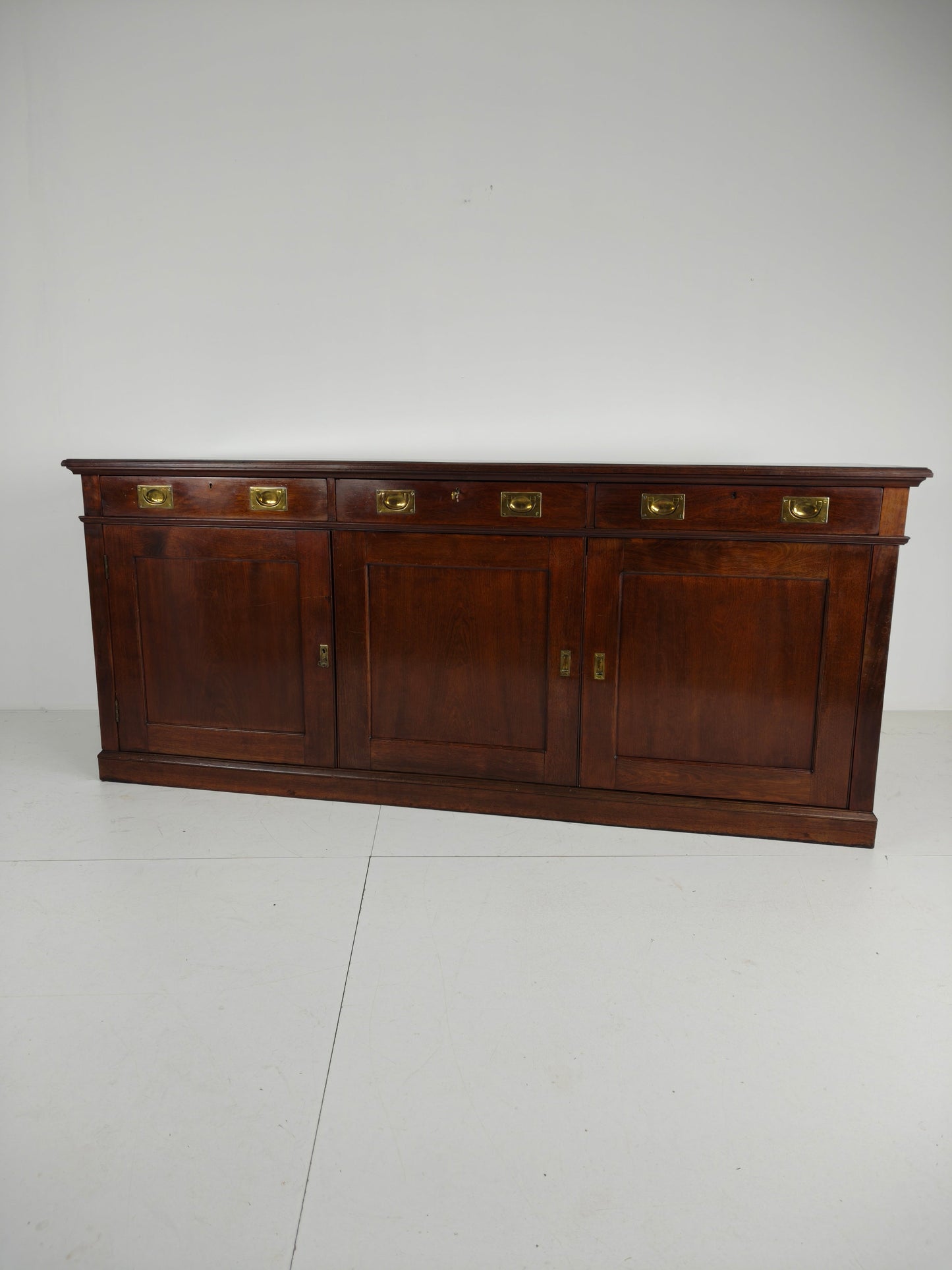 Early 20th-Century English Mahogany Dresser / Sideboard – Brass Campaign Hardware Early 20th-Century English Mahogany Dresser / Sideboard – Brass Campaign Hardware
