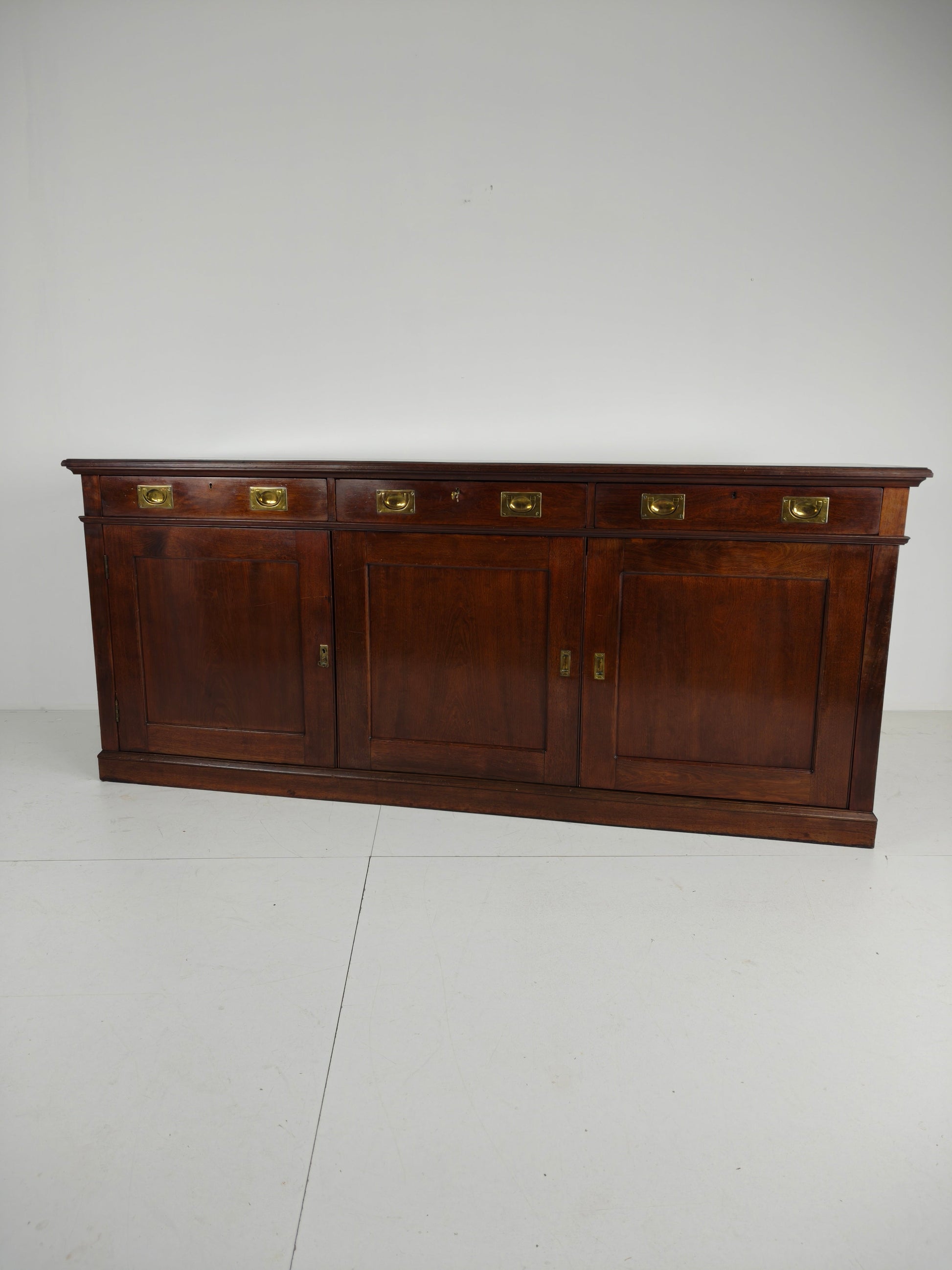 Early 20th-Century English Mahogany Dresser / Sideboard – Brass Campaign Hardware Early 20th-Century English Mahogany Dresser / Sideboard – Brass Campaign Hardware