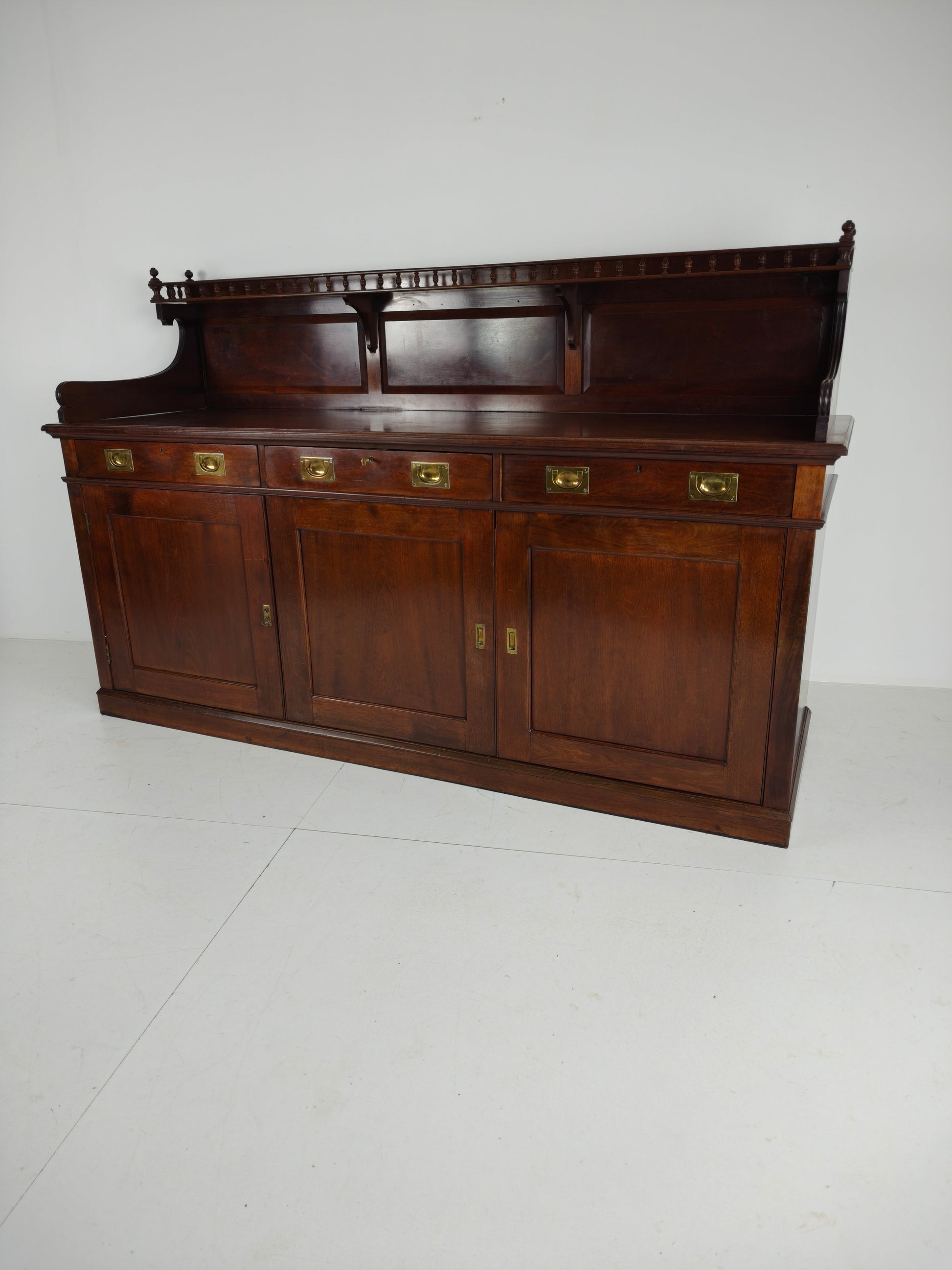 Early 20th-Century English Mahogany Dresser / Sideboard – Brass Campaign Hardware Early 20th-Century English Mahogany Dresser / Sideboard – Brass Campaign Hardware