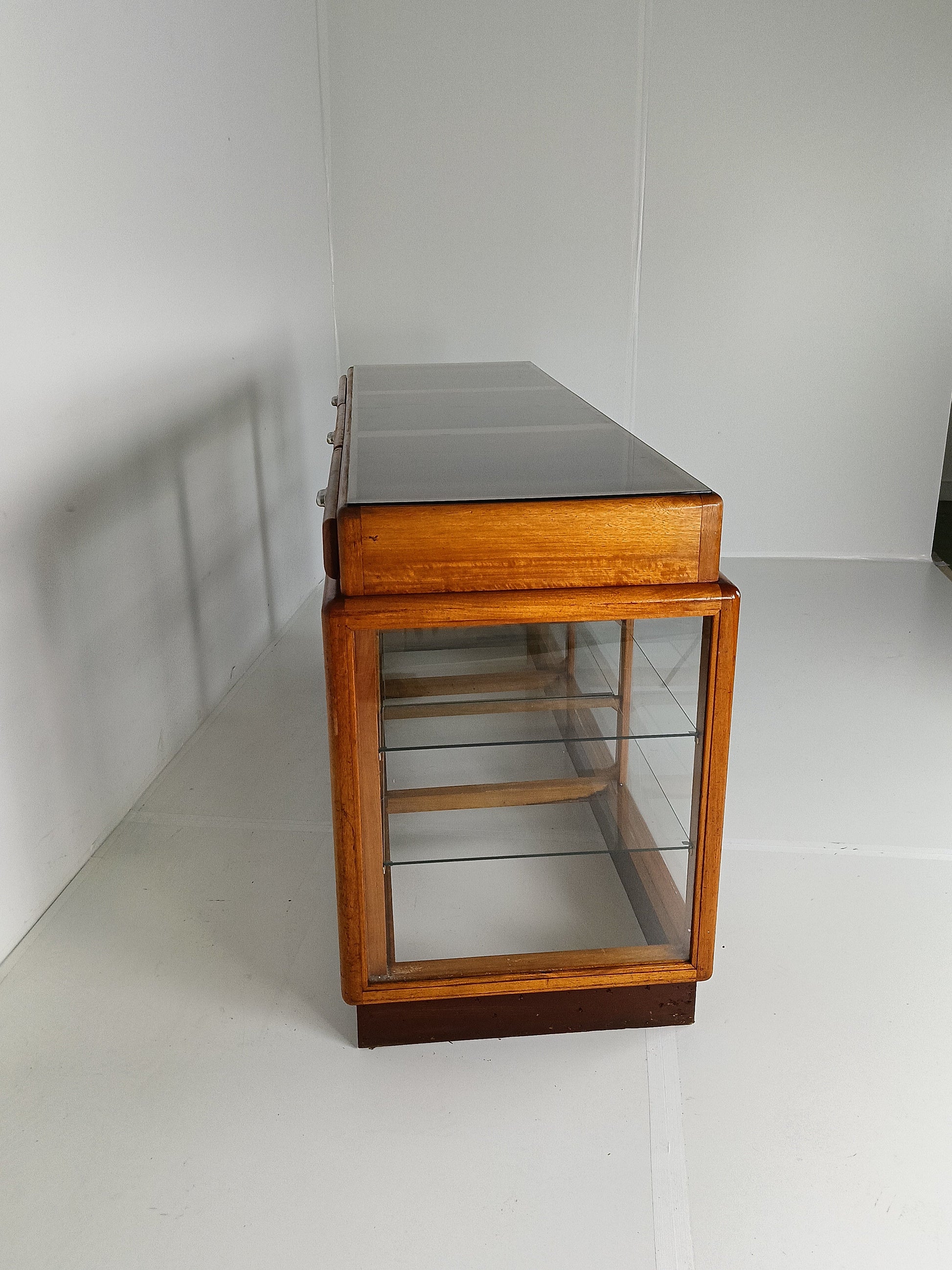 Elegant Antique Store Display With Glass Shelves Elegant Antique Store Display With Glass Shelves
