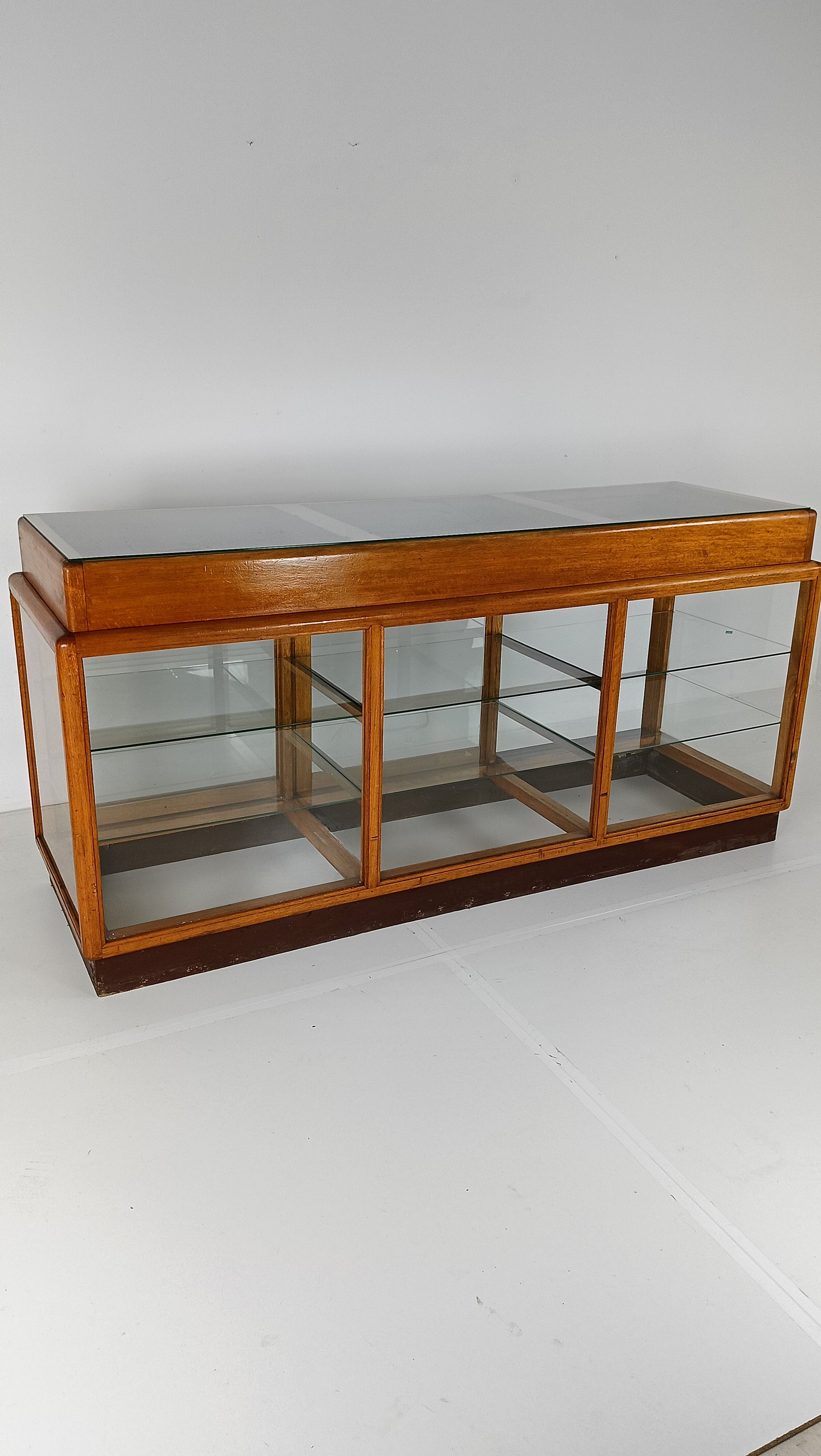 Elegant Antique Store Display With Glass Shelves Elegant Antique Store Display With Glass Shelves